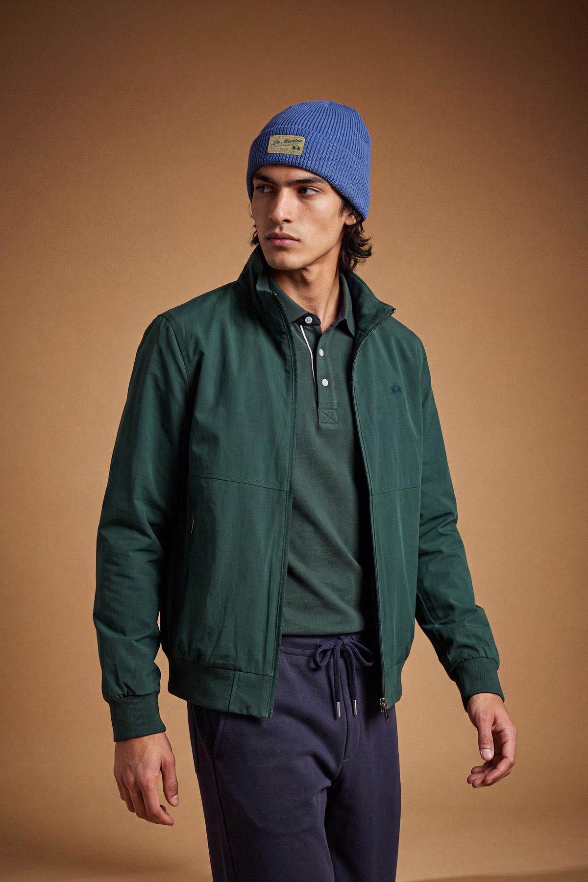Men's padded jacket in cotton-polyamide blend for comfort and durability. Features high collar, zip closures, elastic ribbed trims, and polyester quilted lining - Pine Grove