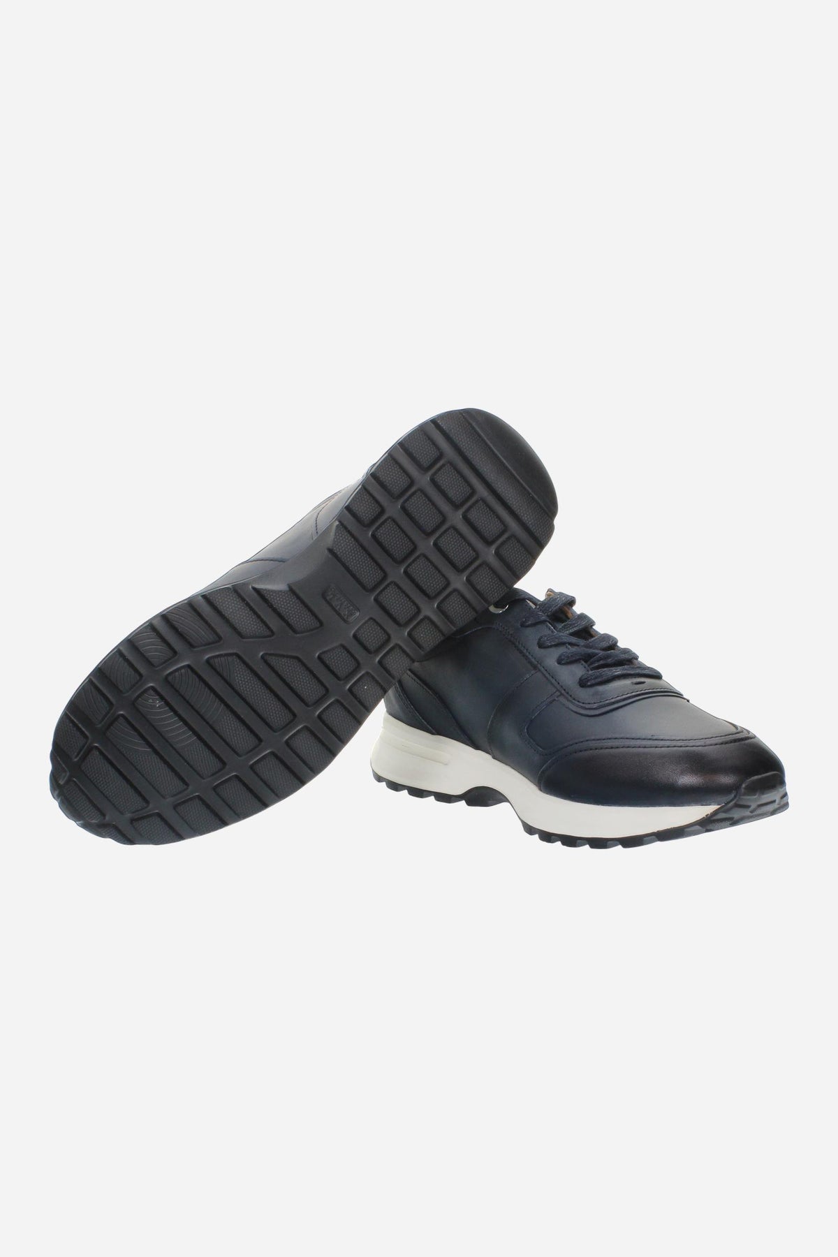 Men's leather sneaker with tone-on-tone stitching, hand-stitched details, embossed logos, and a lightweight two-tone EVA sole for comfort and grip. - Salute