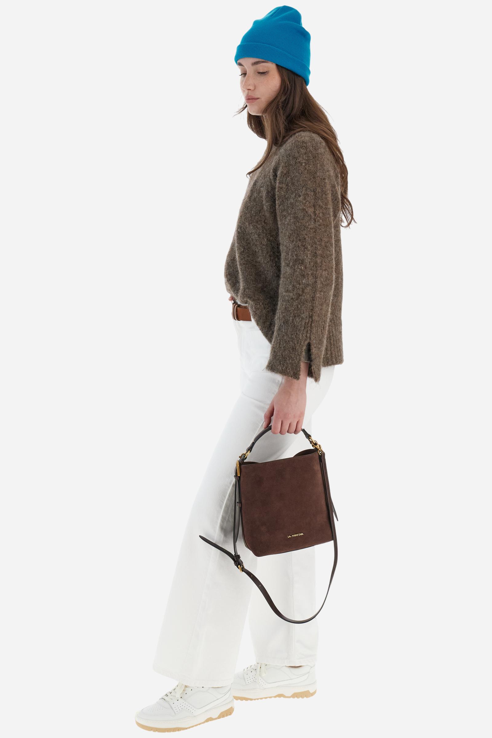 Women’s turtleneck sweater with long sleeves in solid-colour wool and mohair blend, soft and warm. Ribbed turtleneck for elegance and warmth, side slits and sleeve slits for a modern look. Logo on small golden metal plate applied to the front hem. Regular, soft fit for a versatile and comfortable silhouette. The model wears size 2. - Bungee Cord