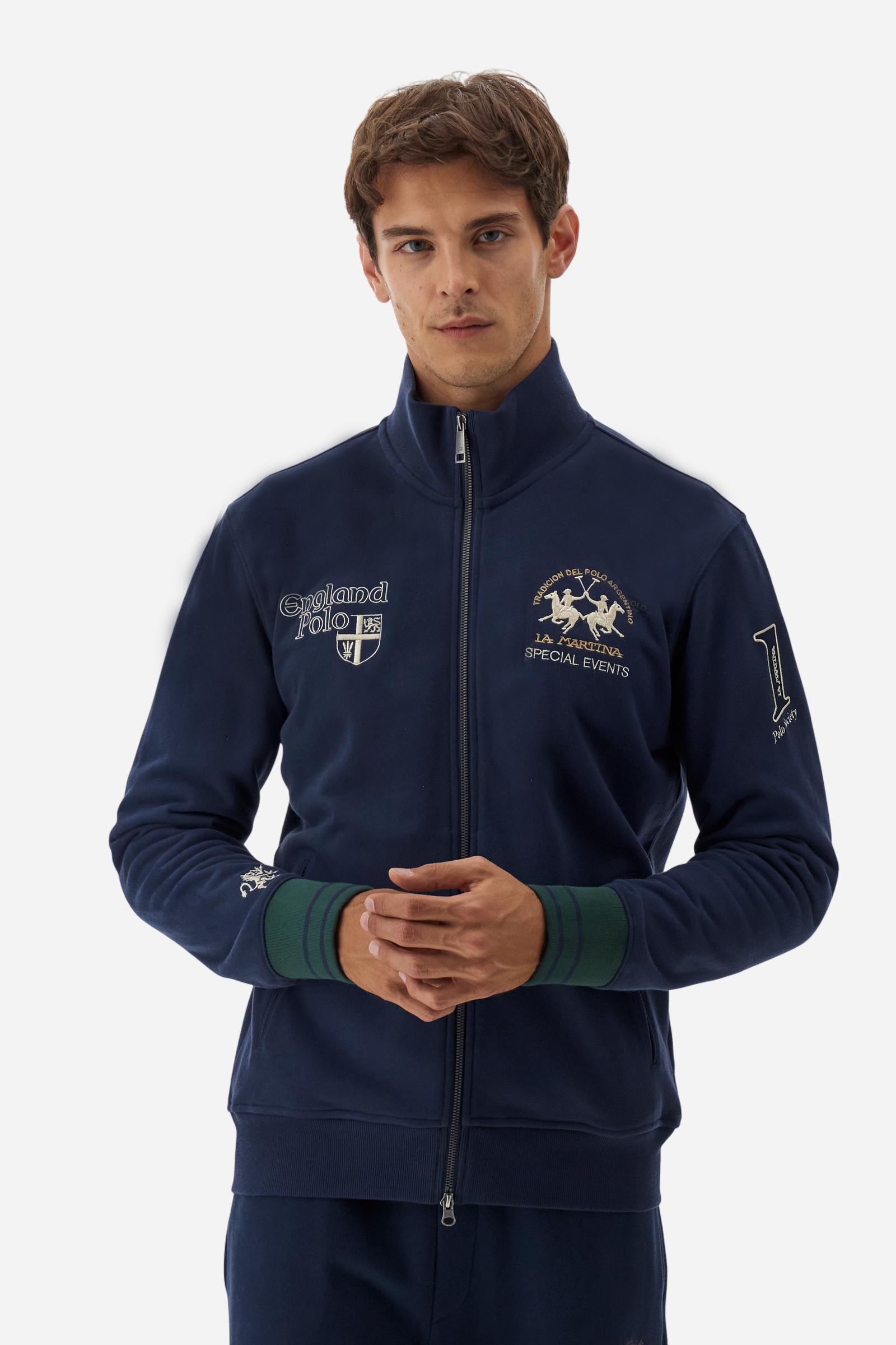 Men's long-sleeved sweatshirt in solid cotton with customised front zip. Contrast rib cuffs and inner collar with multicolour stripe add character. Chest and sleeve decorated with graphics dedicated to the English polo team, large embroidered team logo on the chest. Regular fit providing comfort and functionality. Model wears size L. - Navy