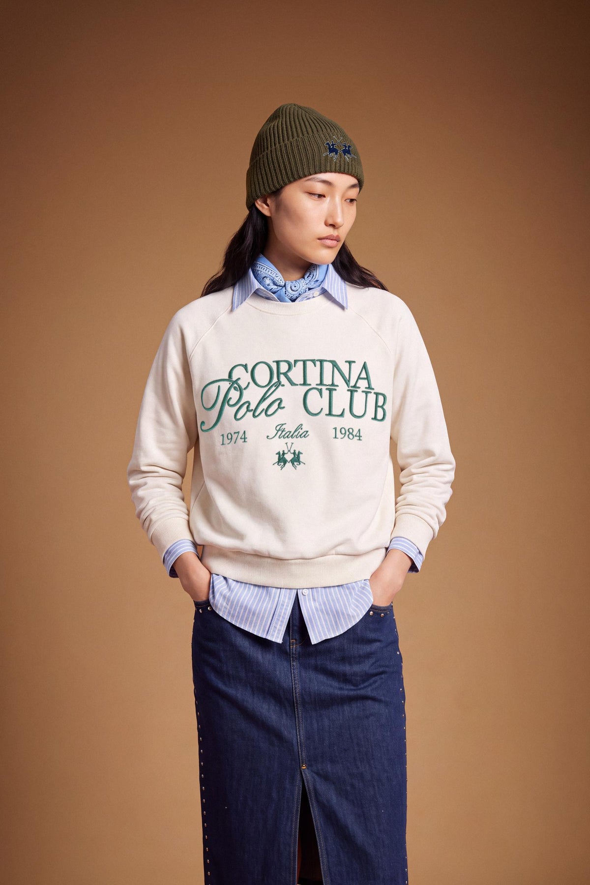 Women's long-sleeve sweatshirt in soft brushed cotton with ribbed crew neck, cuffs, and hem. Relaxed fit with embroidered large Cortina Polo Club logo for style and comfort. - Pristine