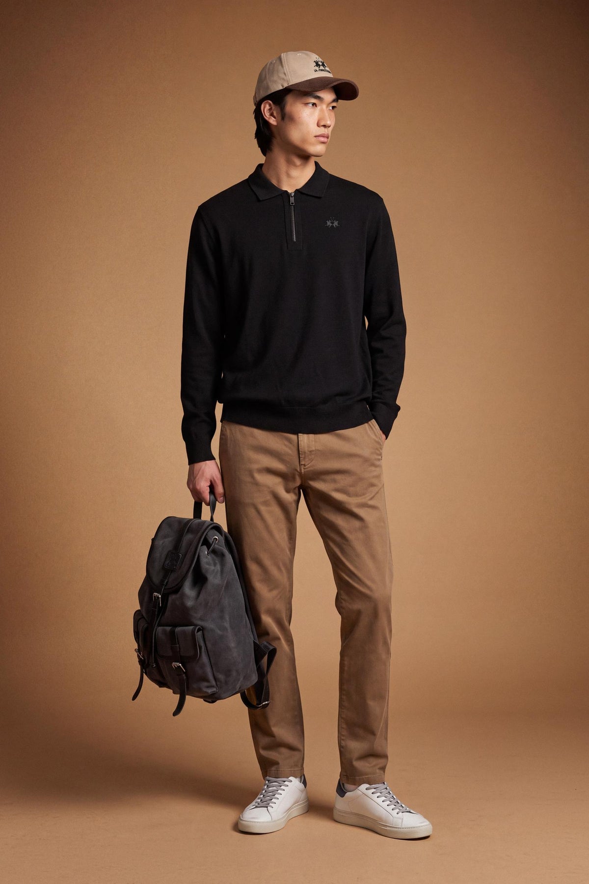Men's long-sleeve sweater in 100% fine wool with a regular fit, knitted polo collar, half-zip front, natural shoulders, and tone-on-tone embroidered logo. - Black