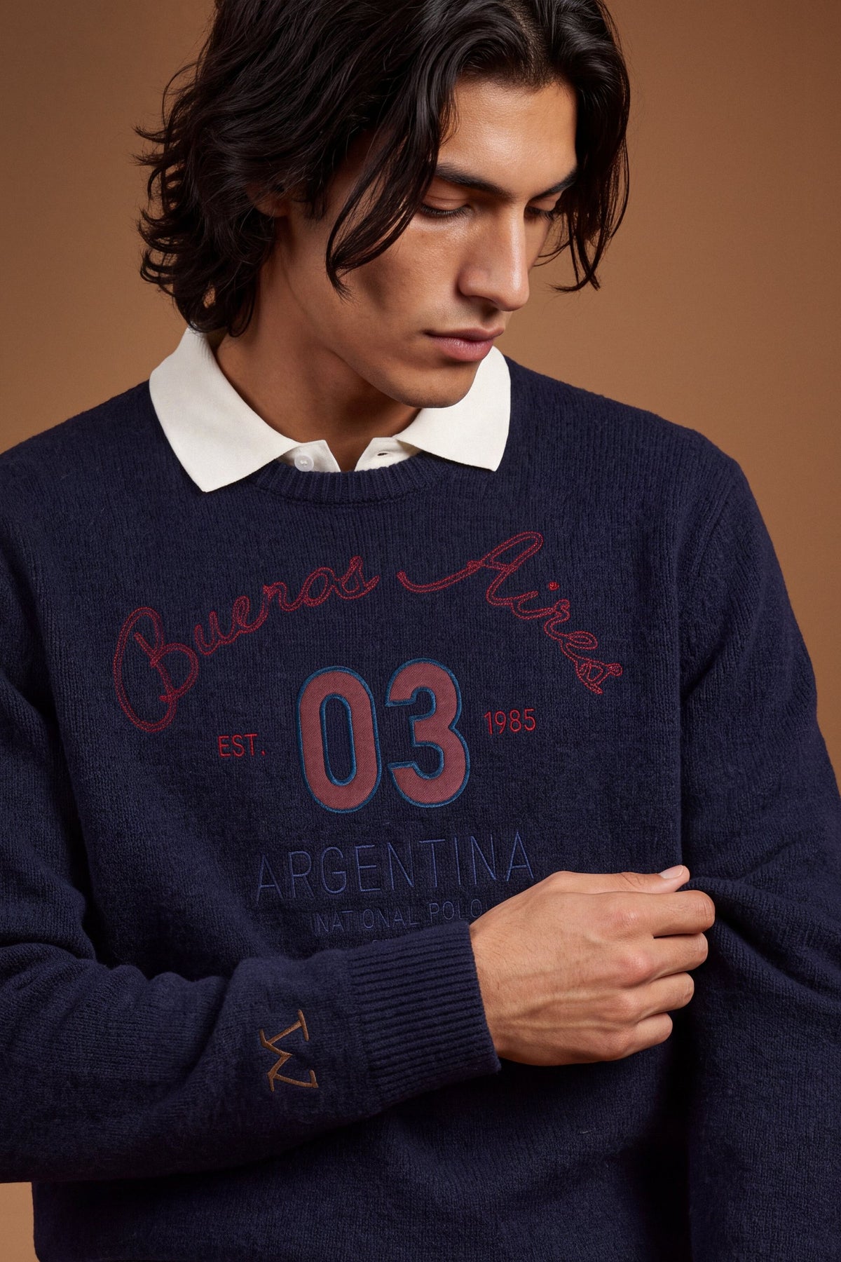 Men’s long-sleeve sweater with lambswool and alpaca blend for warmth and softness, featuring relaxed fit, wide sleeves, ribbed crew neck, and detailed embroidered design. - Navy