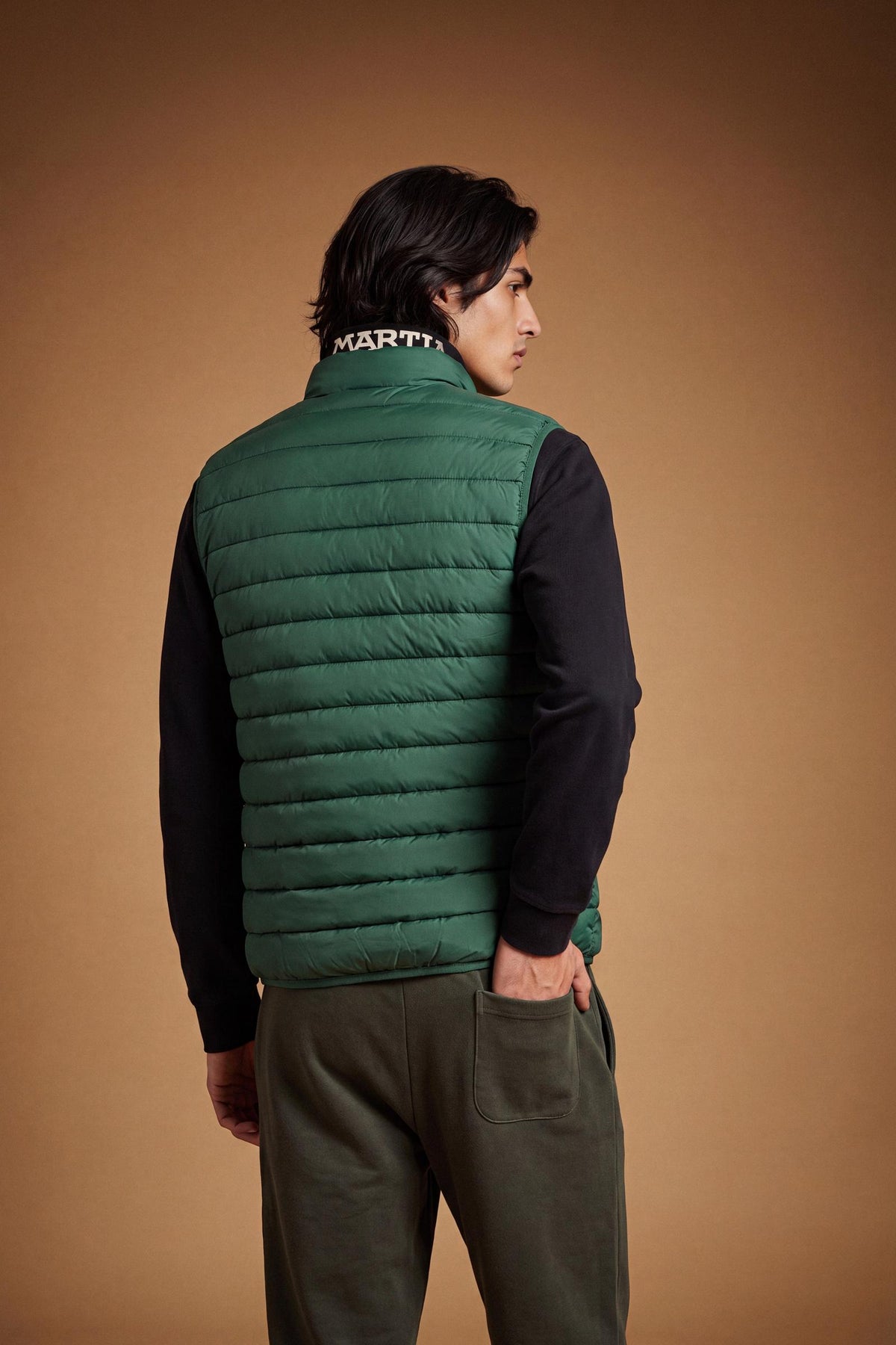 Men's sleeveless down jacket in lightweight nylon with wadding padding for warmth, zippered pockets, high collar, and contrasting interior and logo details. - Pine Grove