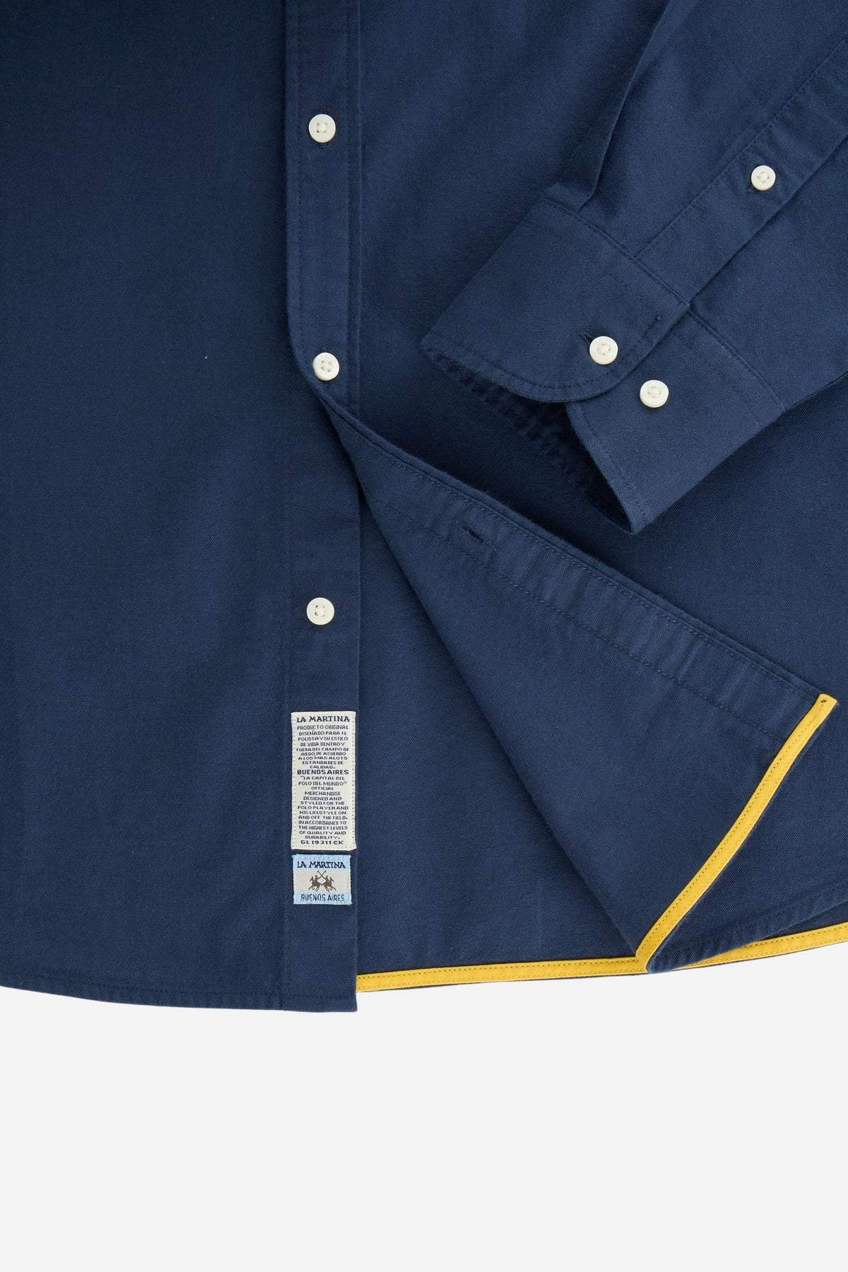 Men’s long-sleeve 100% cotton Oxford shirt with a soft texture, regular tailored fit, button-down collar, mother-of-pearl buttons, and detailed embroidered patches. - Navy