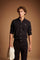 Men's long-sleeve 100% cotton poplin shirt with regular fit, French collar, custom buttons, single-button cuff, and Argentina Edition labels for a refined look. - Black