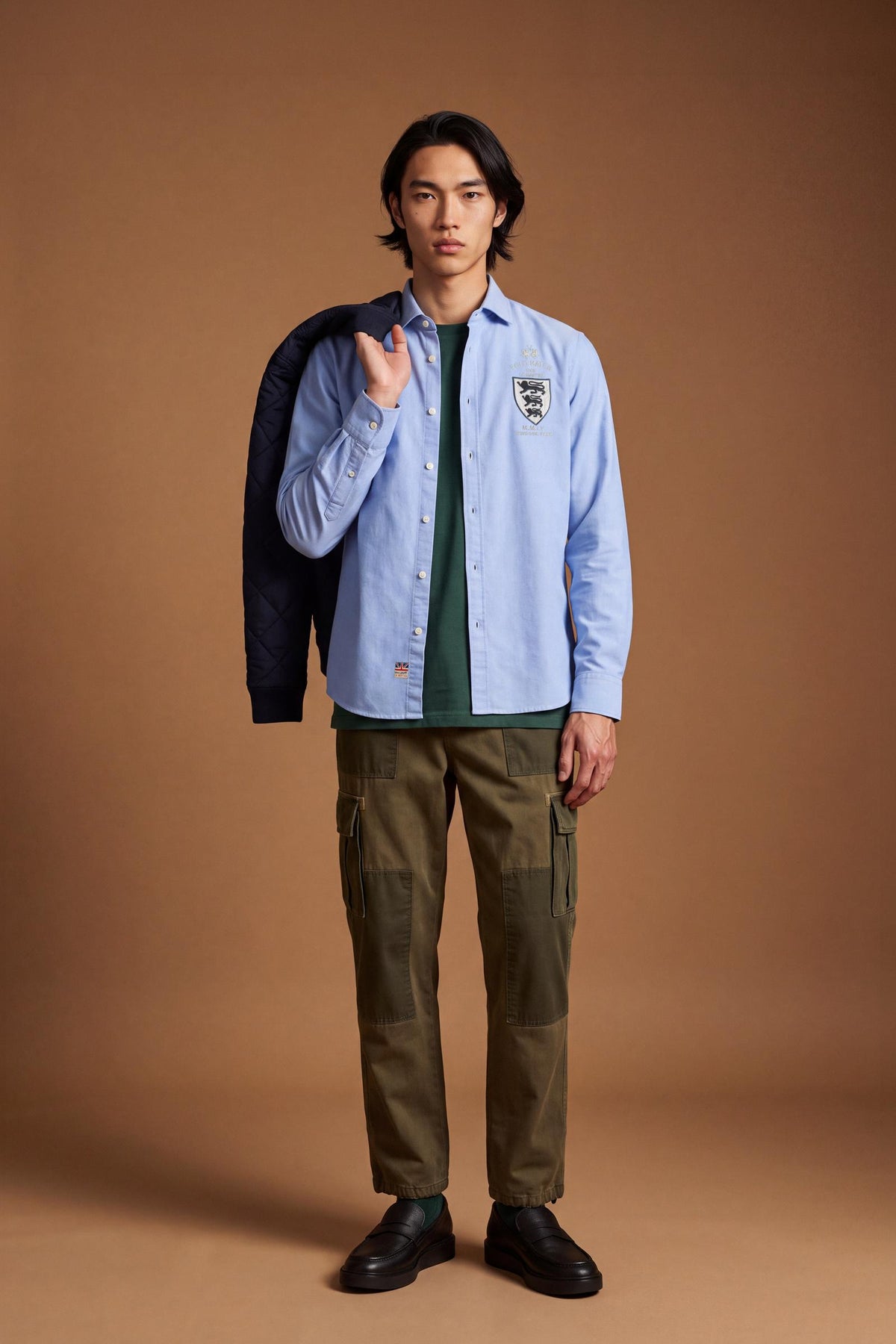 Men's 100% cotton Oxford shirt with a soft feel, regular fit, button-down collar, mother-of-pearl buttons, Polo Match embroidery, and embroidered number 3 patch. - Cornflower blue