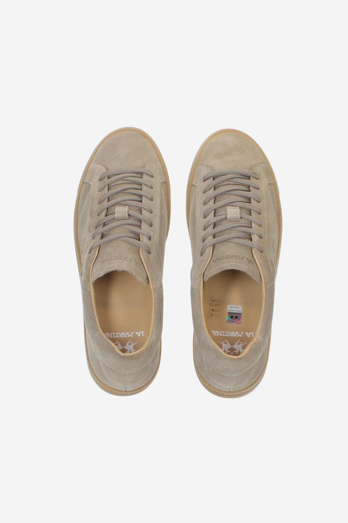 Men’s suede sneaker with flexible two-part leather tongue, hand-stitched embossed logo, amber rubber sole, and lightweight Strobel construction for all-day comfort. - Taupe Gray