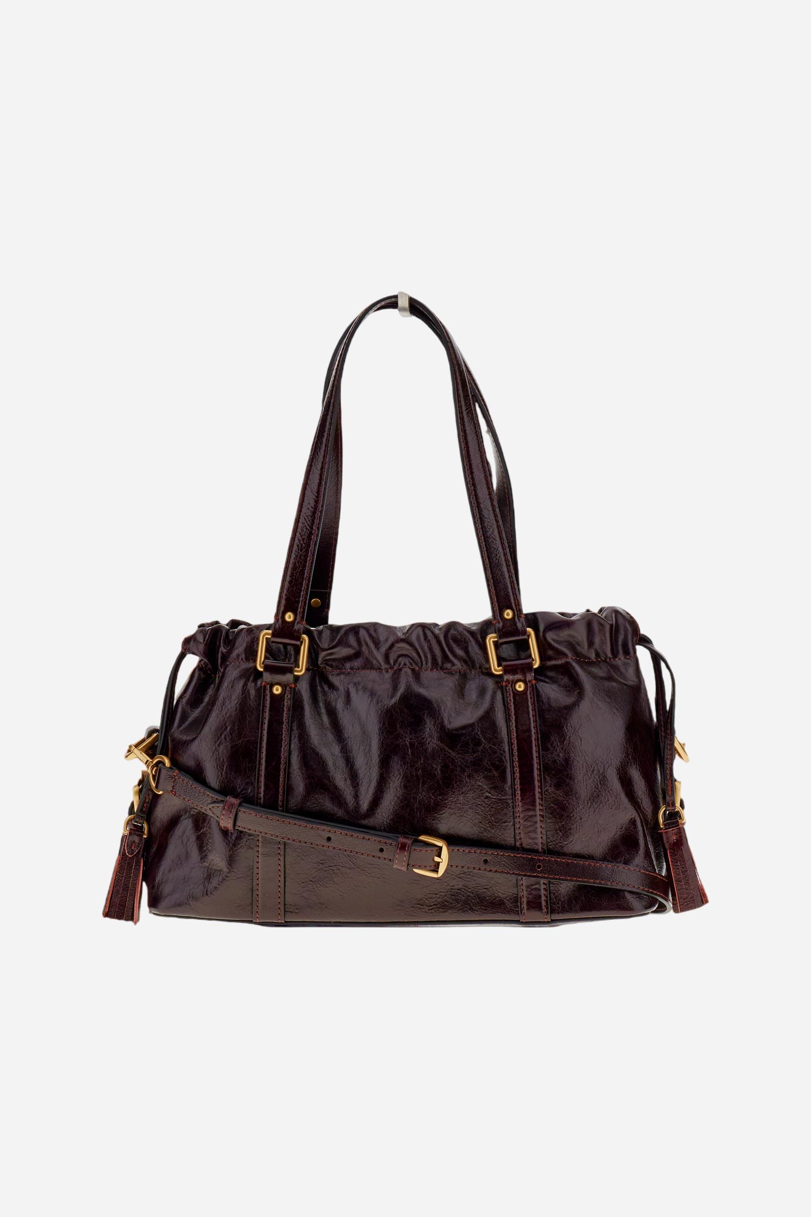 Vintage-finish calfskin tote bag with drawstring closure. Gold-tone details and La Martina logo on the front. - WINE
