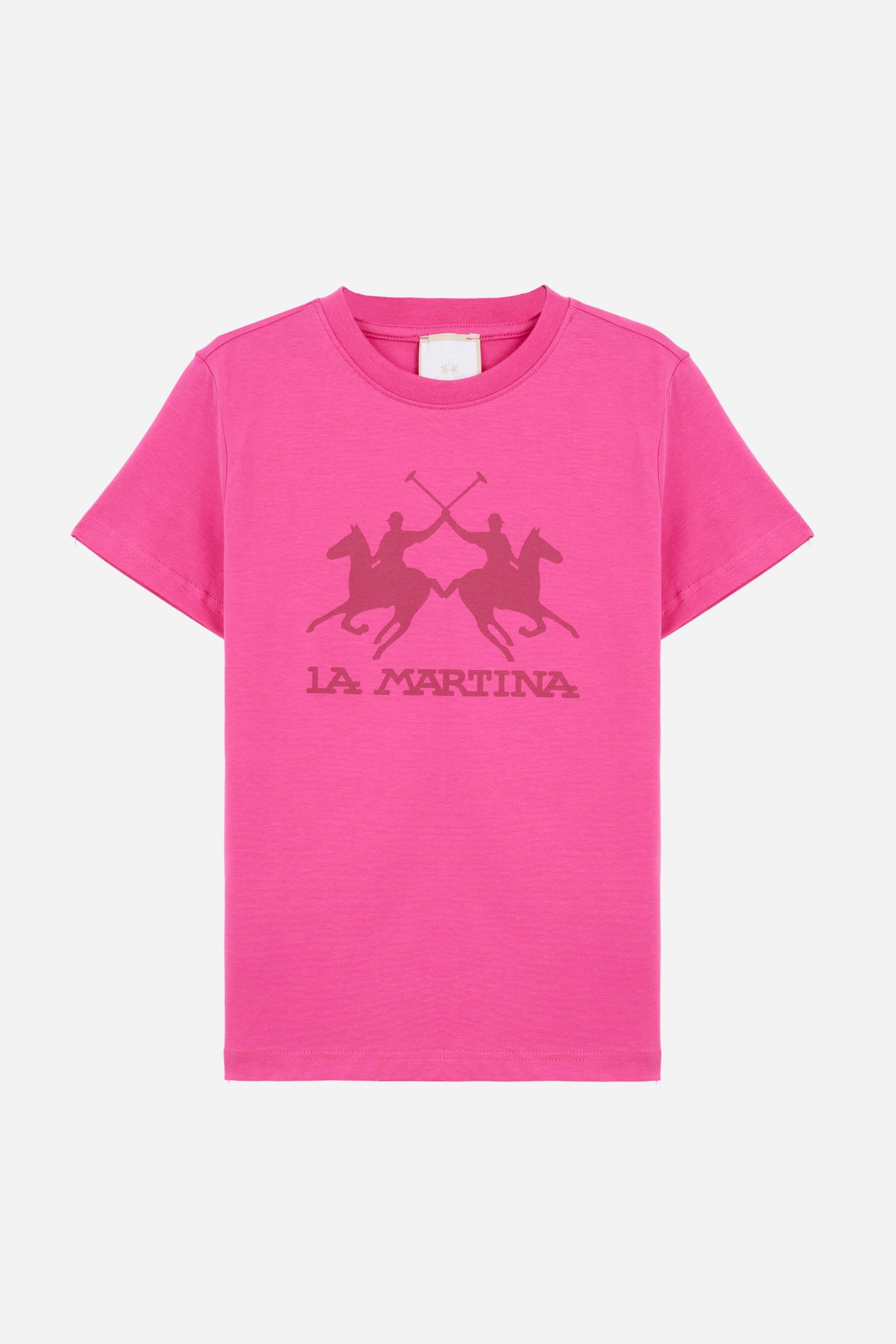 Short-sleeved T-shirt for girls made from soft 100% cotton jersey in a solid colour. The style features a regular fit and tonal ribbed crew neck. The maxi front print, featuring the iconic crossed polo players logo and La Martina lettering, enhances the garment with a sporty and recognisable style. - Fandango Pink