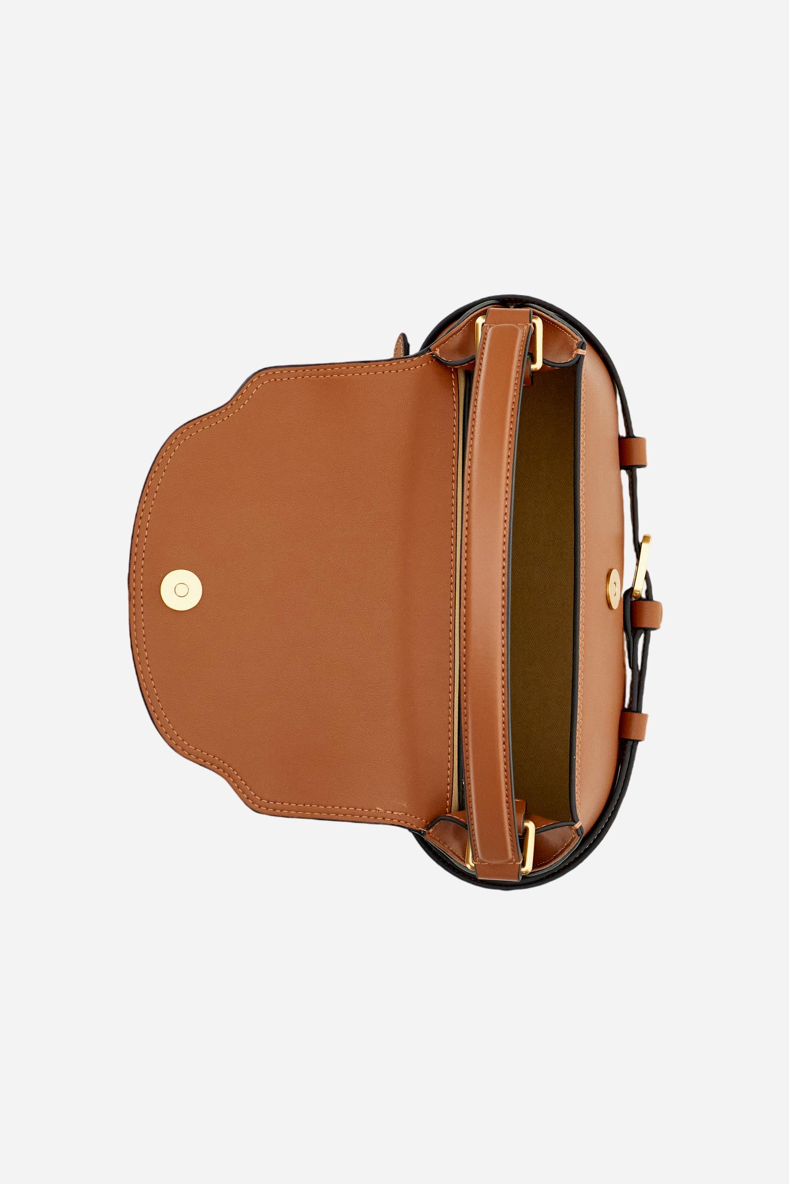 Small trapeze tote bag in calfskin leather. Refined and compact, with flap, rigid handle and removable strap. - COGNAC