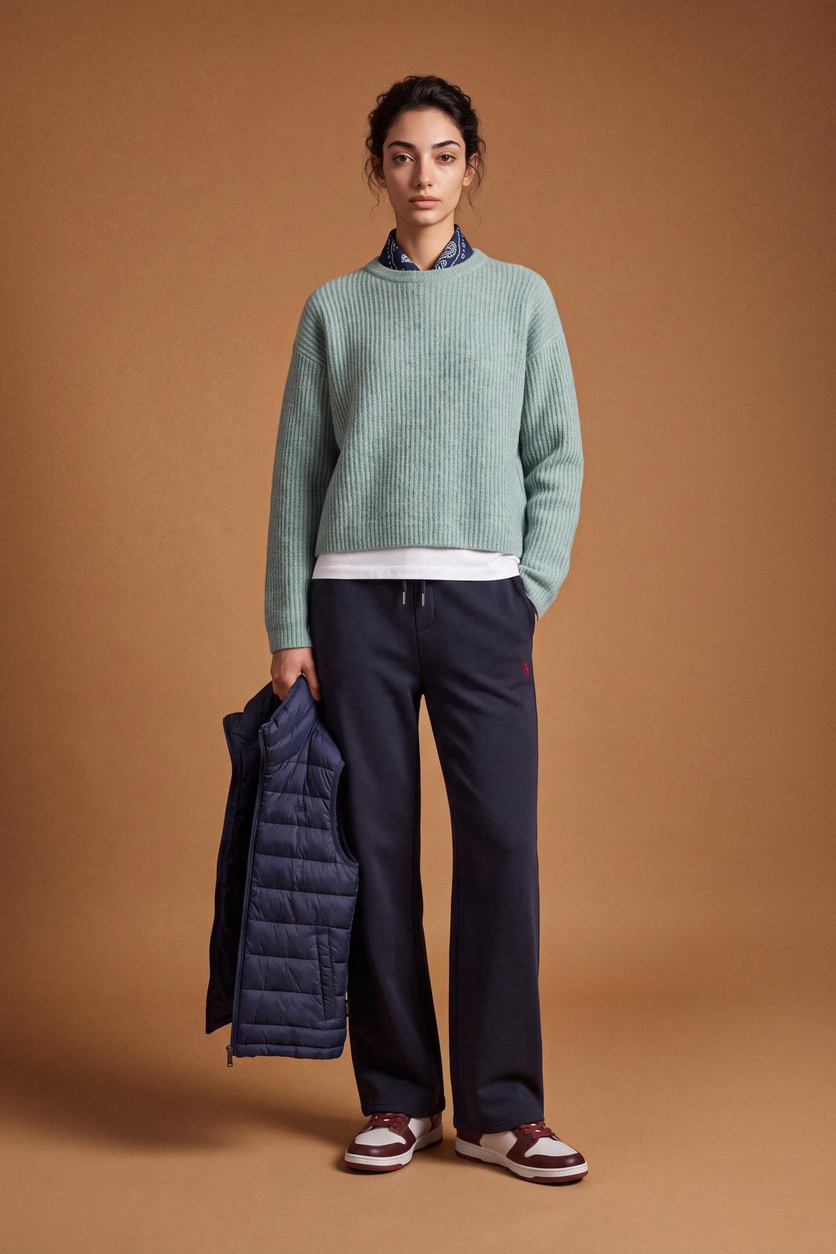 Soft lambswool women's sweater with vertical ribbed knit, relaxed fit, dropped shoulders, cropped length, and a subtle embroidered logo on the back neckline. - Desert Sage