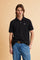 Men’s short-sleeve stretch piqué polo. Two-button placket and ribbed details, with a regular fit. Iconic style characterised by applied logo and patches. - Black                                                                                                                                                                                                                                                                                                                                                               