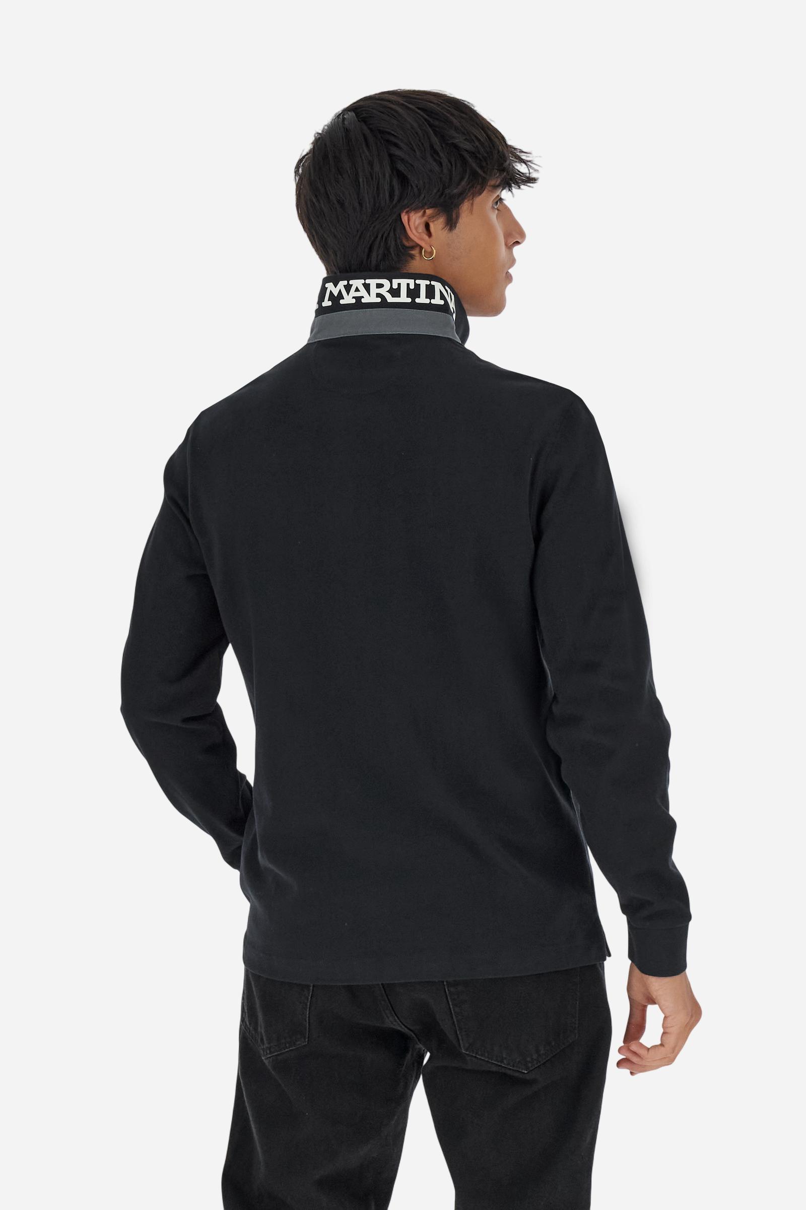 Classic men’s long-sleeve polo in soft-touch 100% cotton jersey. Contrast gabardine collar, three-button placket with multicolor striped tape. Iconic La Martina lettering printed in contrast under the collar. Small contrast logo embroidered on the chest. Regular fit for a balanced silhouette. Model wears size L. - Black