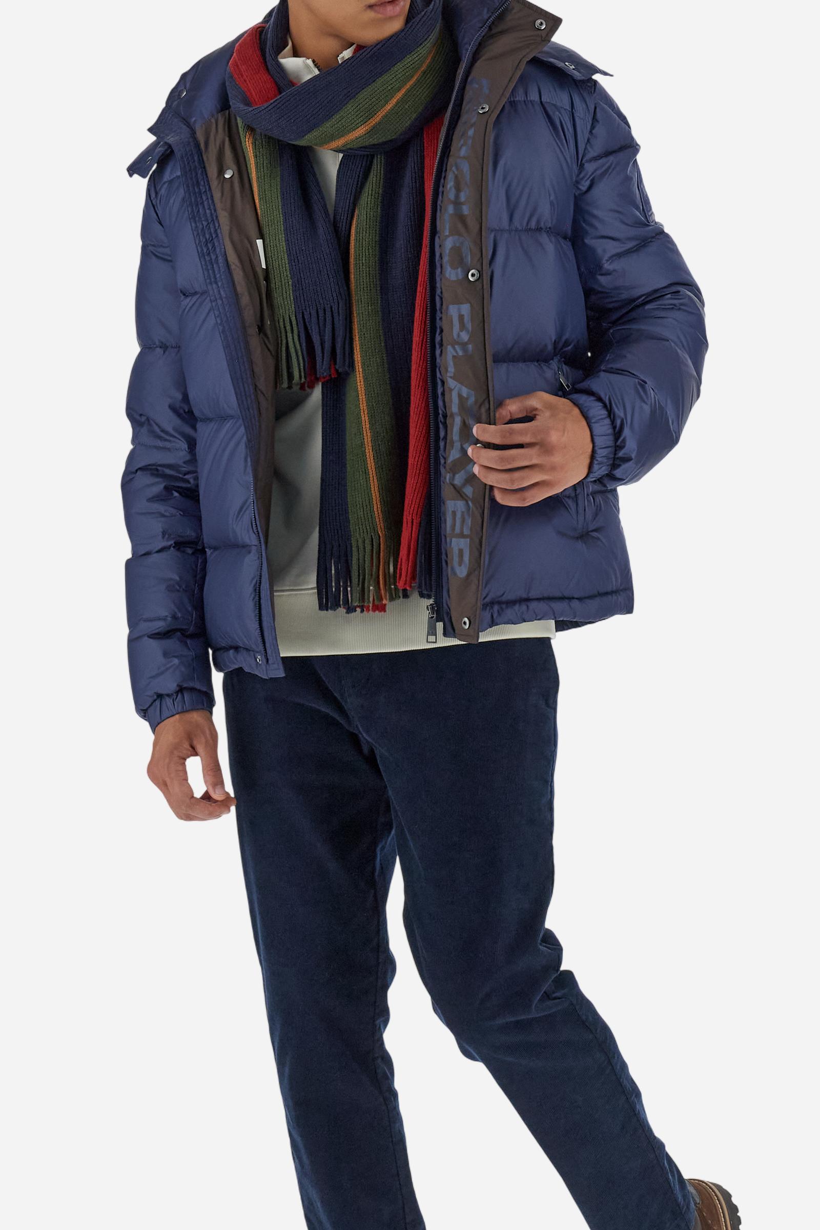 Men’s padded bomber jacket with detachable hood. Made of solid iridescent nylon with contrast lining. Equipped with two practical inner braces for extra comfort. Double customized zip front closure with inner placket featuring contrast Polo Player print, closed with metal snap buttons. Two vertical zipped pockets on the front. Hood with contrast lining and adjustable elastic drawstring. Bold Polo Player graphics printed inside. Regular fit for comfortable movement without bulk. Model wears size L. - Navy