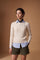 Women's long-sleeve crew neck sweater in wool-cashmere blend with classic cable knit, ribbed details, and a subtle embroidered logo for a refined, comfortable fit. - Antique White