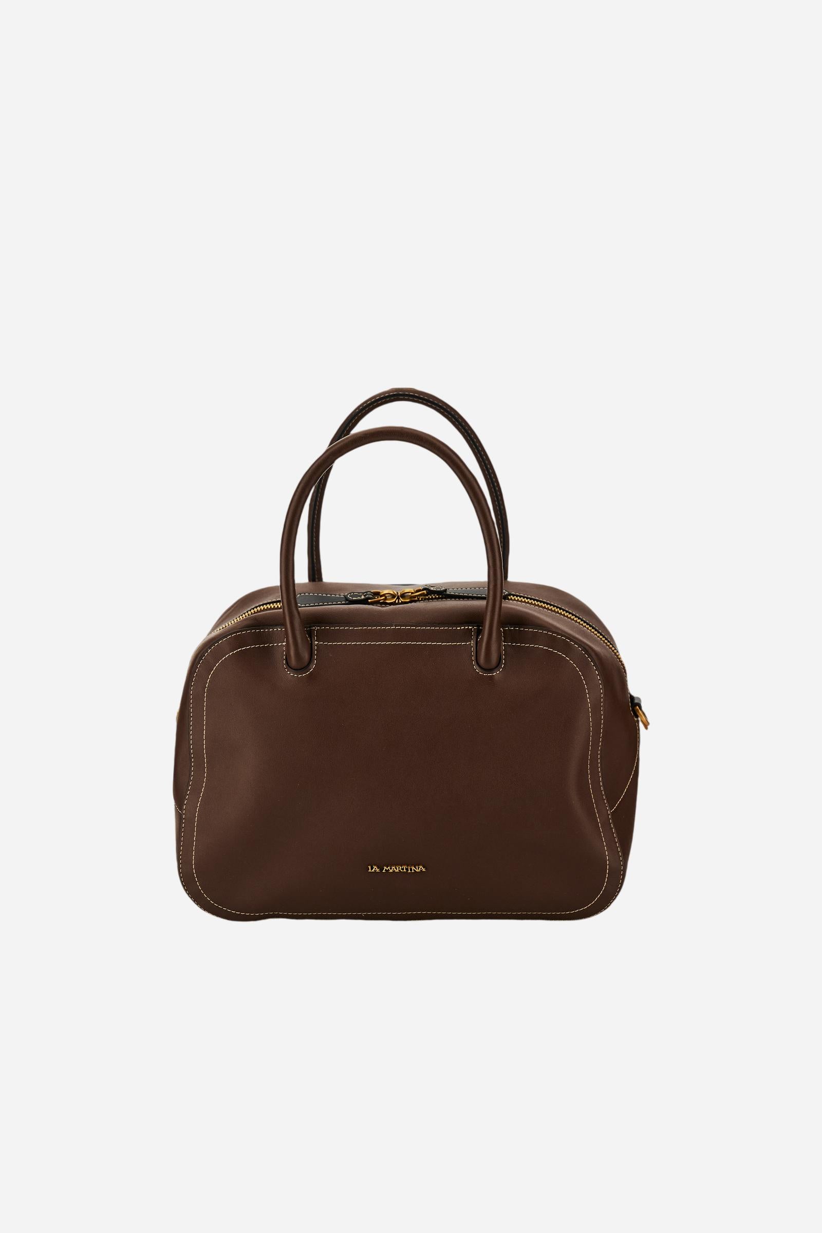 Elegant women's tote in full-grain leather with semi-rigid structure, gold-tone stirrup detail, double handles, adjustable strap, and roomy, secure interior. - Sienna/Black