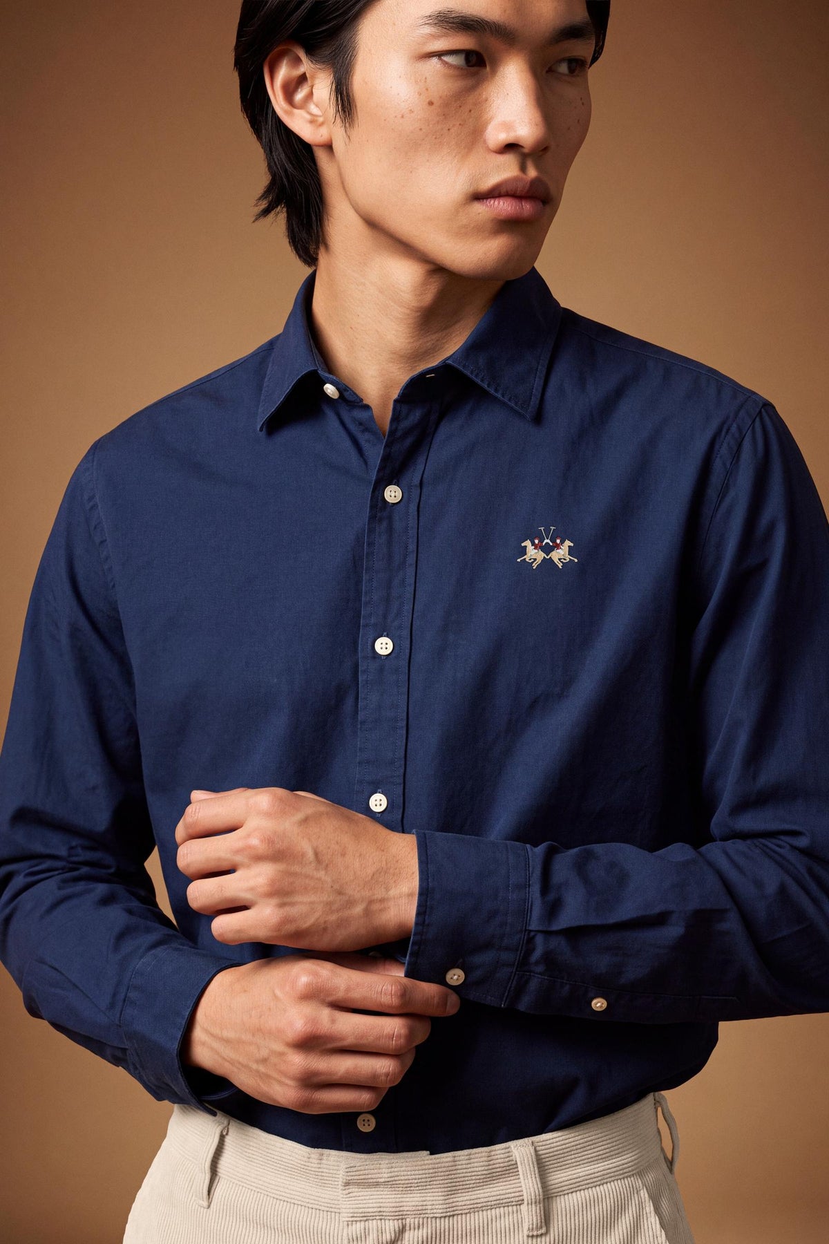 Men's long-sleeve 100% cotton poplin shirt with regular fit, French collar, custom buttons, single-button cuff, and Argentina Edition labels for a refined look. - Navy