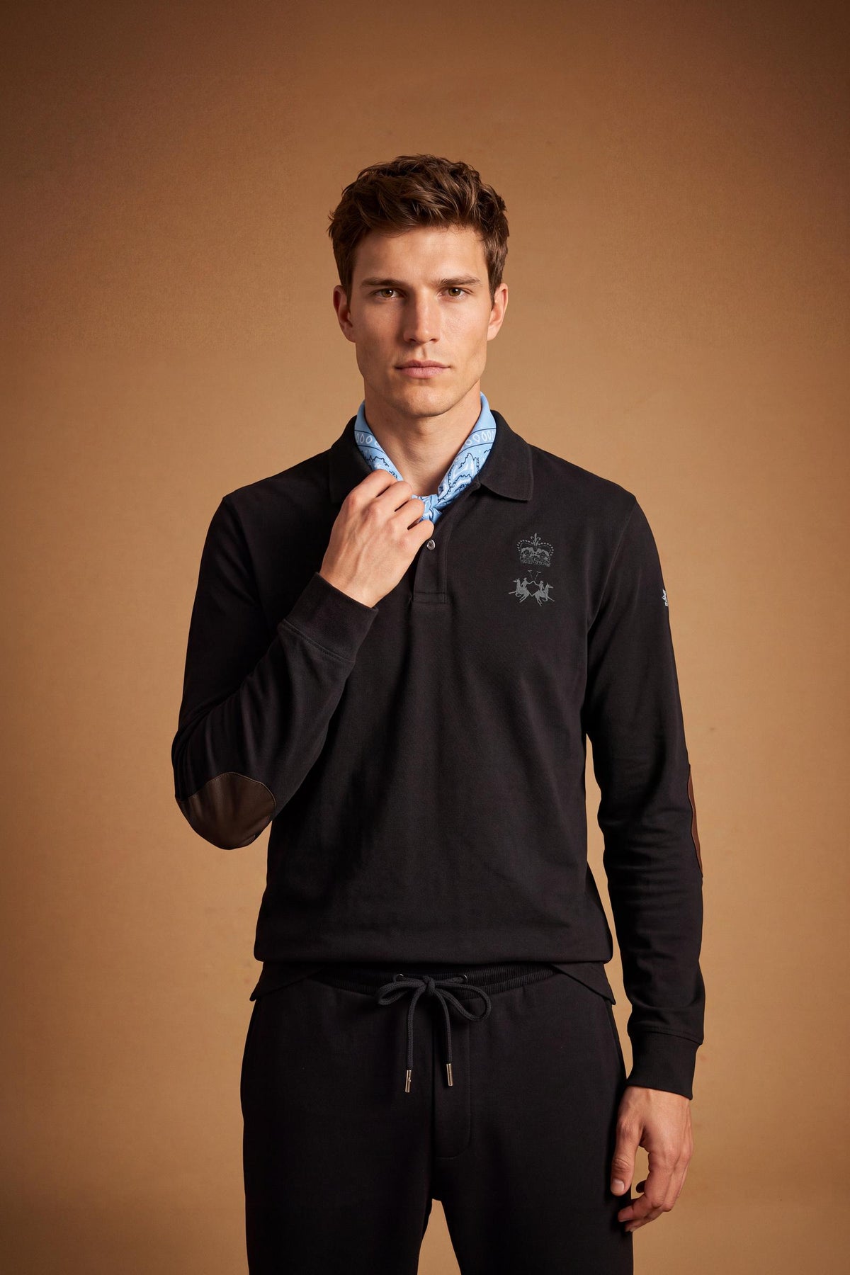 Men's long-sleeve cotton piqué polo with ribbed collar and cuffs, reinforced elbow patches, embroidered details, and a comfortable regular fit for lasting style. - Black