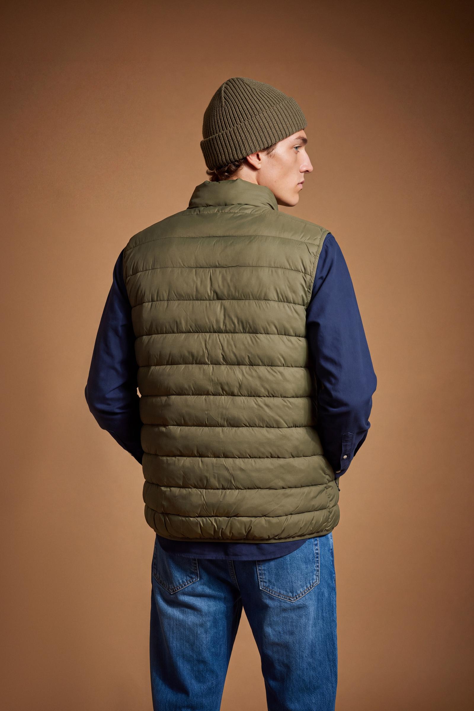 Men's sleeveless down jacket in lightweight nylon with wadding padding for warmth, zippered pockets, high collar, and contrasting interior and logo details. - Burnt Olive
