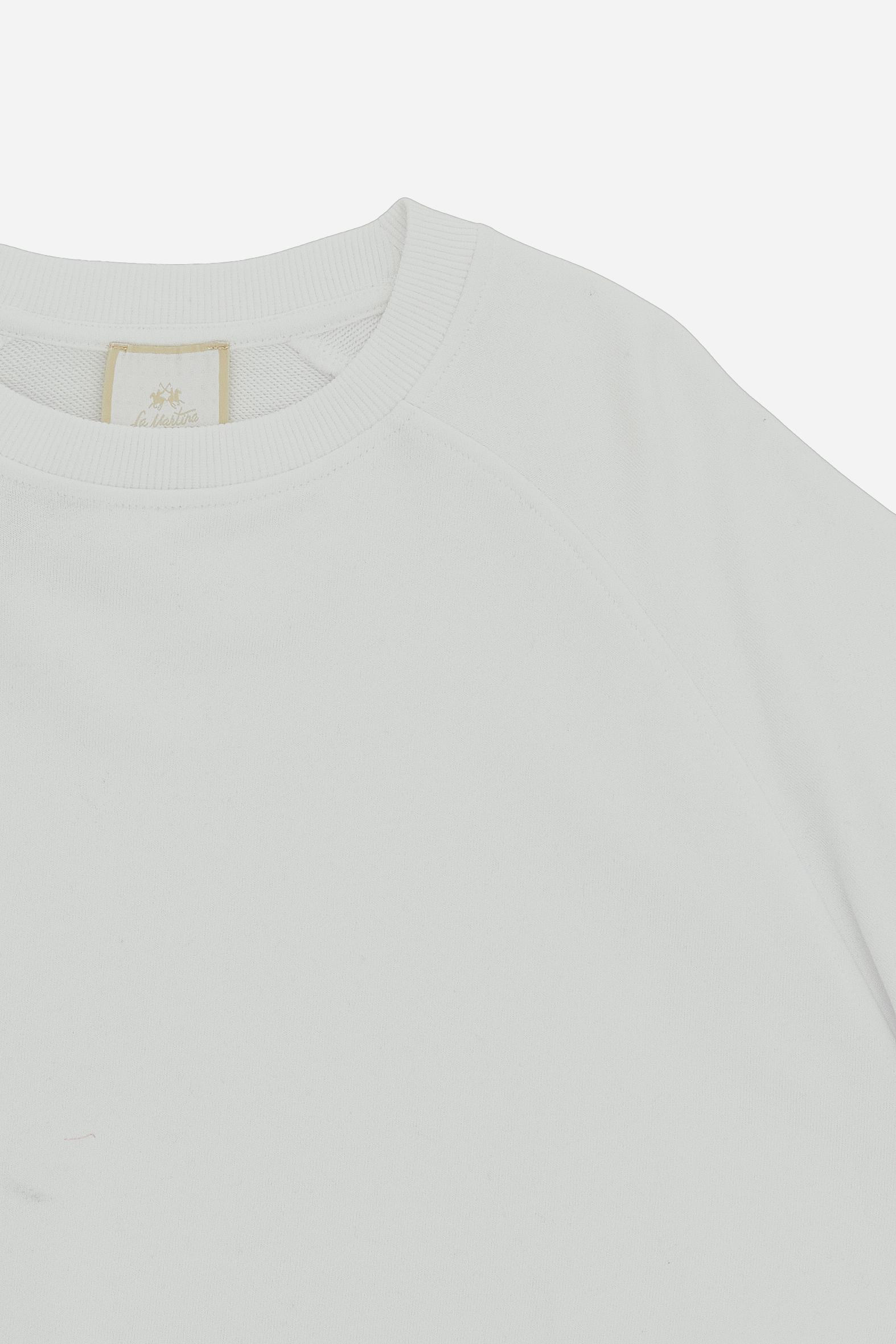 Women’s long-sleeve cotton sweatshirt. Relaxed-fit style with raglan sleeves, soft volume and regular length, finished with ribbed details and embroidered logo patch below the collar. - Optic White                                                                                                                                                                                                                                                                                                                           