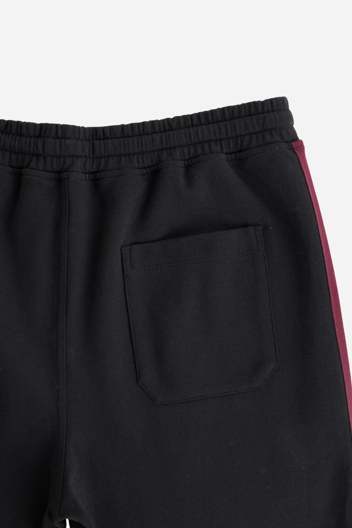 Men's cotton interlock jogging pants with elastic waistband, adjustable drawstring, side and back pockets, multicolored stripes, and a soft, sporty silhouette. - Black