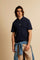 This is the iconic Polo 19-42 from La Martina. Men's short-sleeved polo shirt in solid color made of 100% slub jersey. With a regular fit, it has a collar and a double button closure while the La Martina logo is embroidered in small gold on the front under the placket. Ideal when worn with denim from the collection. Each Polo is kept in an exclusive logoed envelope and is accompanied by a certificate of guarantee. The model is 187 cm tall and wears a size L. - Navy                                           