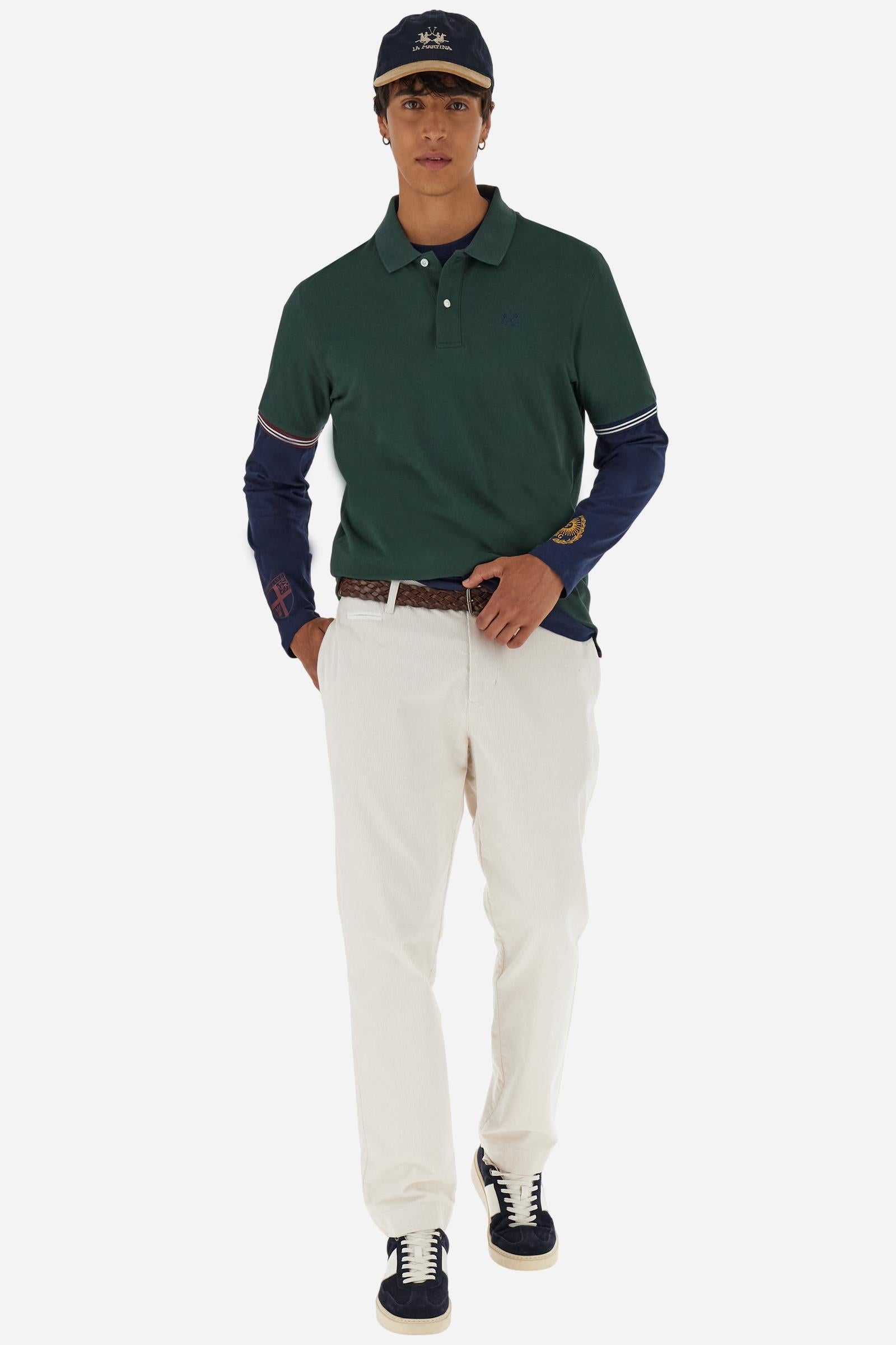 Men’s short-sleeve polo in high-quality stretch cotton piqué, ensuring excellent breathability and flexibility. Classic ribbed collar, two-button placket with customized buttons. Inner collar enriched with contrast tapes and colors for a modern touch. Multicolored ribbed cuffs with different patterns. Small contrast logo embroidered on the chest. Regular fit. Model wears size L. - Sycamore
