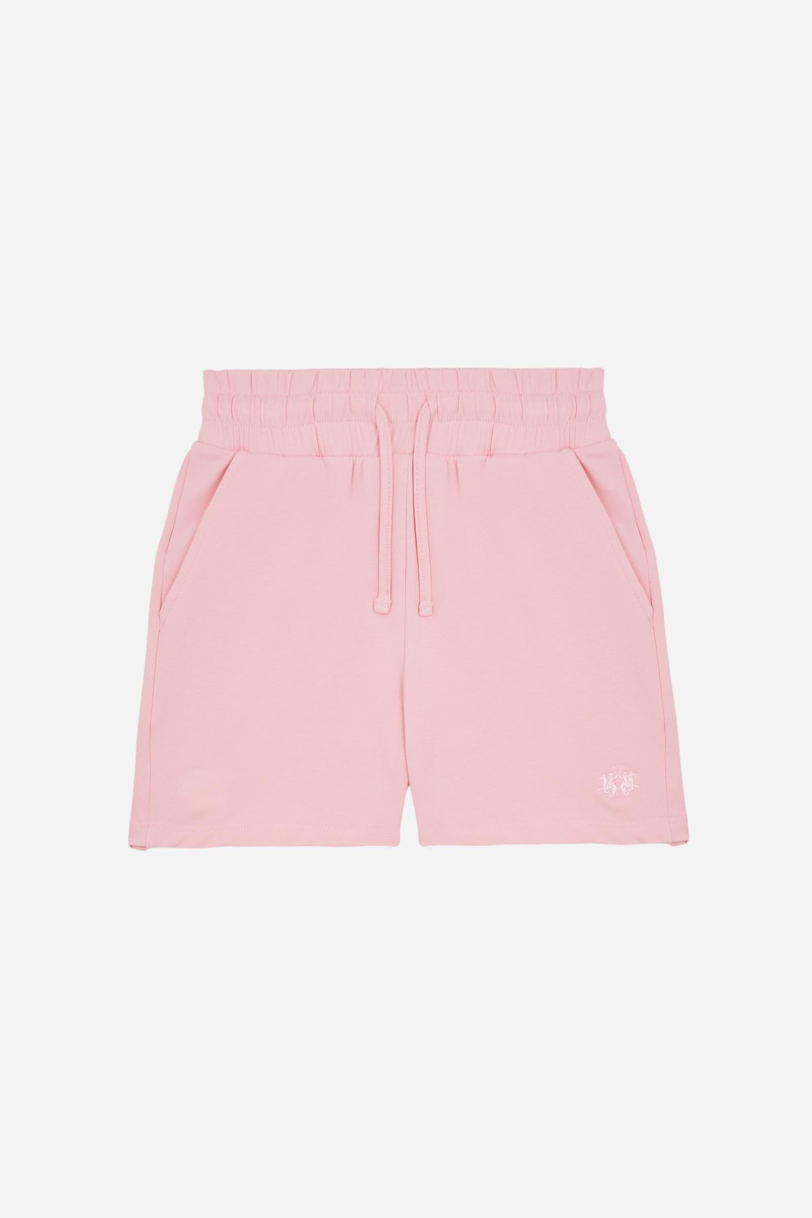 Bermuda shorts for girls made from soft 100% cotton fleece in a solid colour. The style features a regular fit, short leg and elasticated waist with adjustable drawstring. The small contrast embroidered brand logo on the left leg adds a discreet and distinctive detail. A comfortable, versatile garment, ideal for casual and sporty looks. - FairTale
