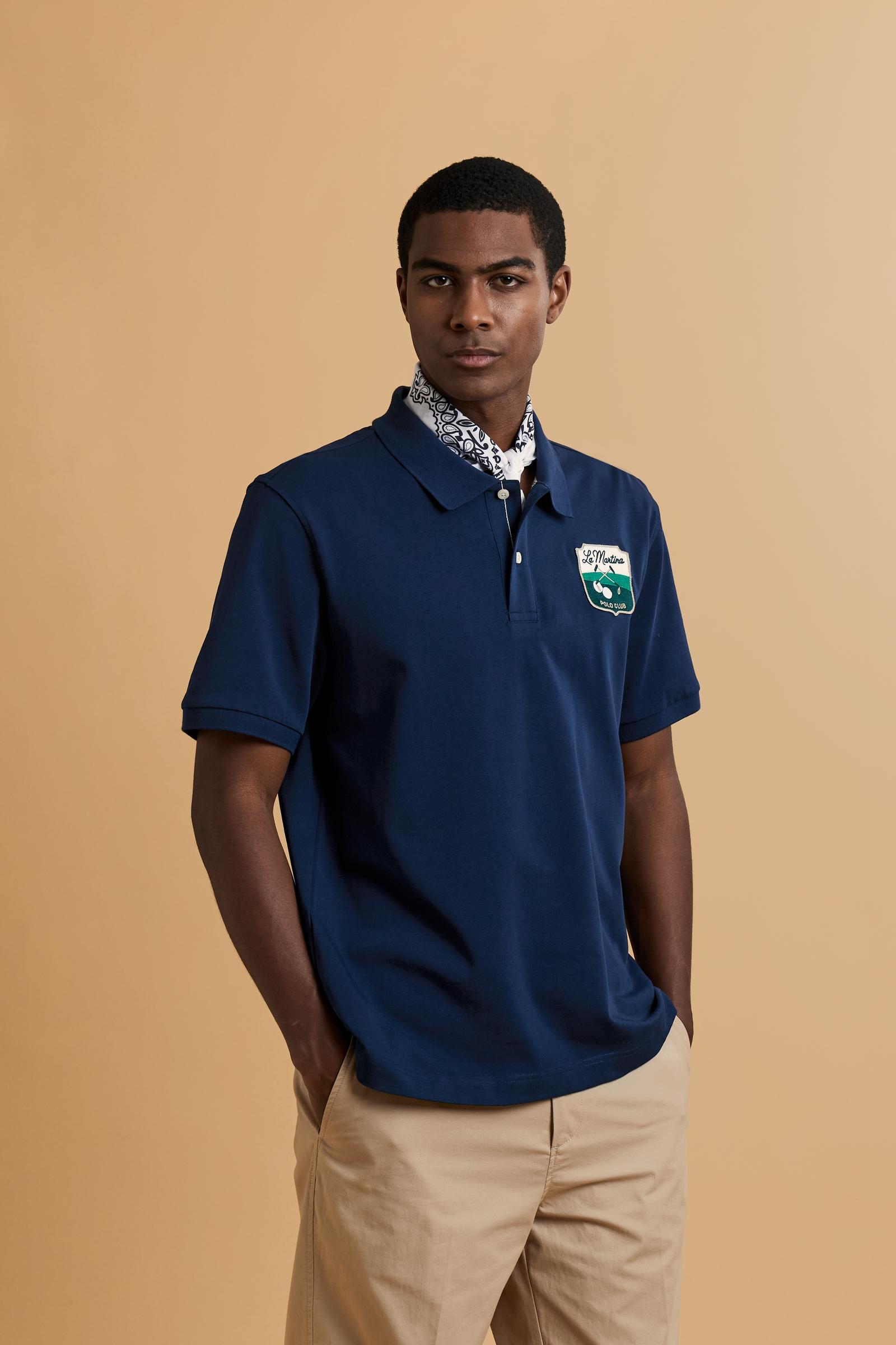 Men’s short-sleeve cotton piqué polo. Two-button placket and contemporary fit, featuring an applied shield patch on the chest and large lettering on the back. - Navy                                                                                                                                                                                                                                                                                                                                                           