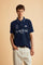 Men's short-sleeve polo in stretch piqué fabric with ribbed details, embroidered logo, bold lettering, and a relaxed regular fit for versatile comfort. - Navy
