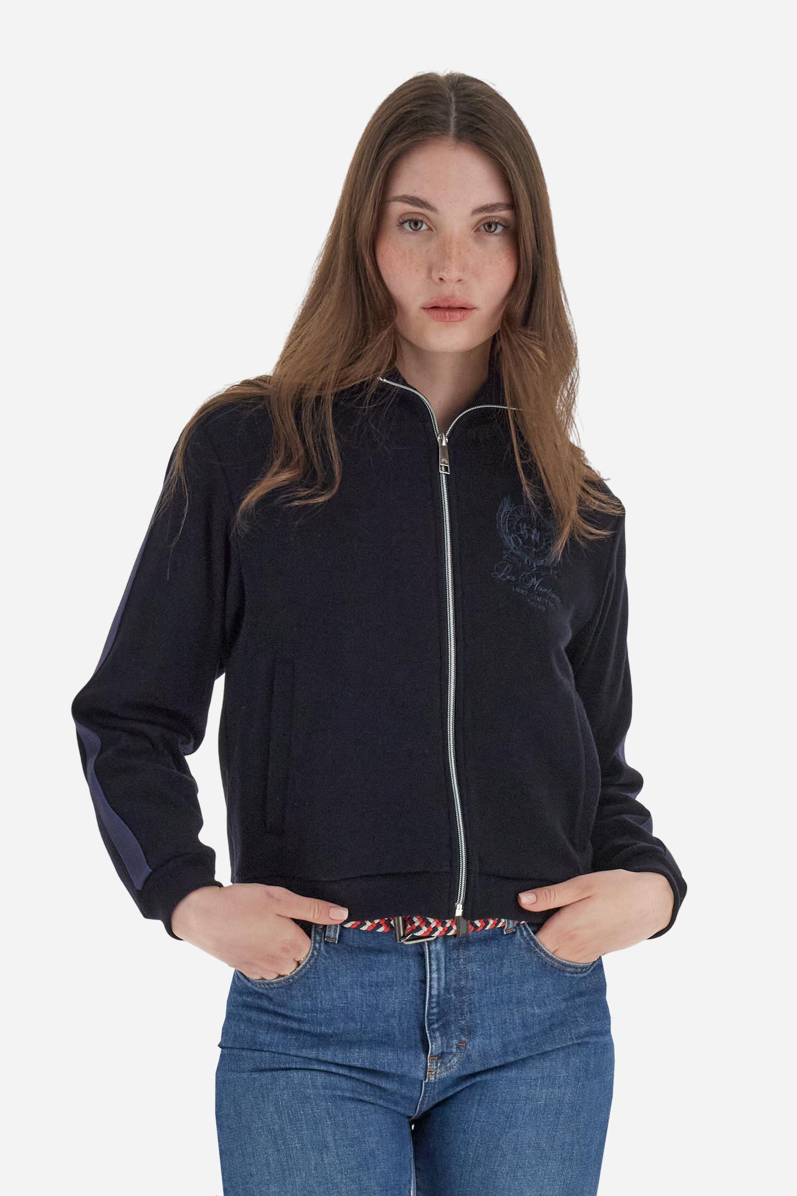 Women’s full-zip sweatshirt with long sleeves in soft interlock viscose blend, offering a luxurious feel on the skin. Straight cut with fluid line and sport-luxury details. Striped bands on the sleeves and heraldic embroidery on the chest add a contemporary touch. The model wears size 2. - Navy