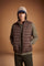 Men's sleeveless down jacket in lightweight nylon with wadding padding for warmth, zippered pockets, high collar, and contrasting interior and logo details. - Hot Fudge