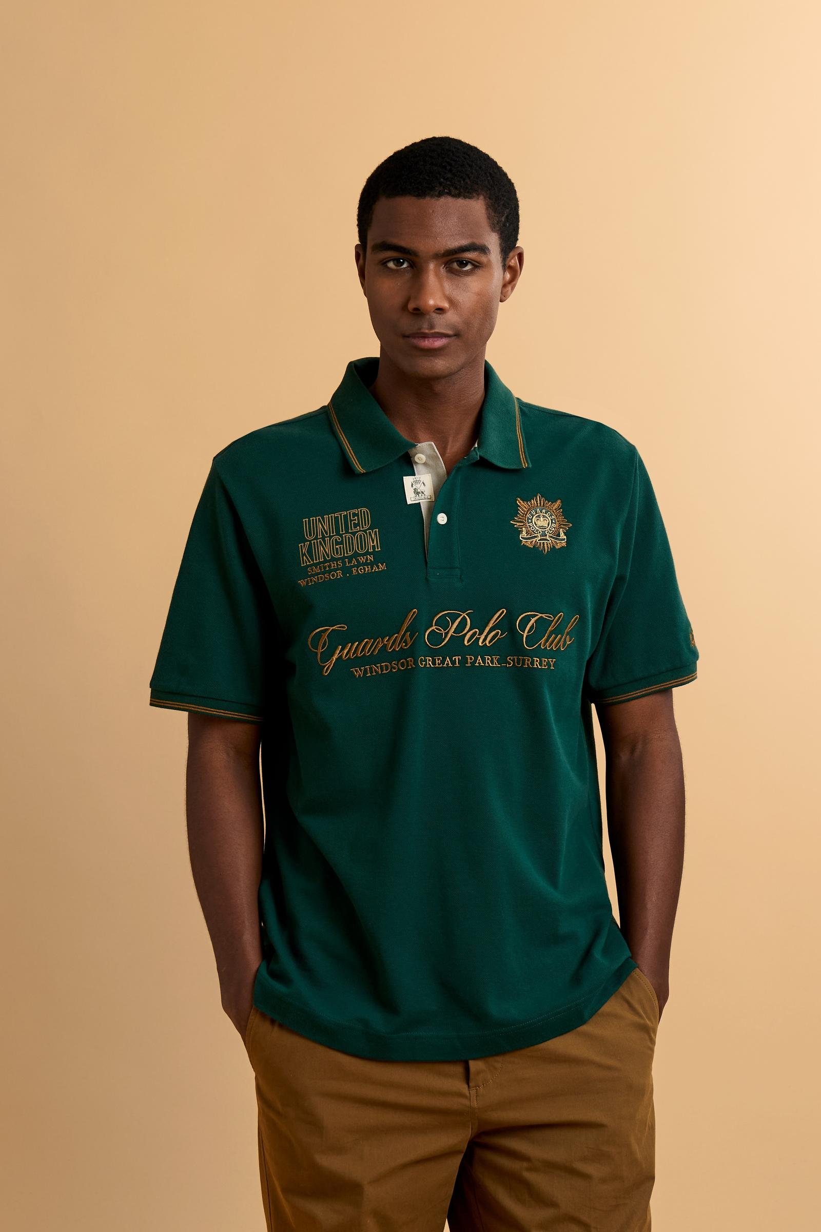 Men’s short-sleeve piqué polo. Contemporary fit with ribbed details on collar and cuffs, enriched with lettering graphics and crests inspired by the Guards Polo Club. - Pineneedle                                                                                                                                                                                                                                                                                                                                             