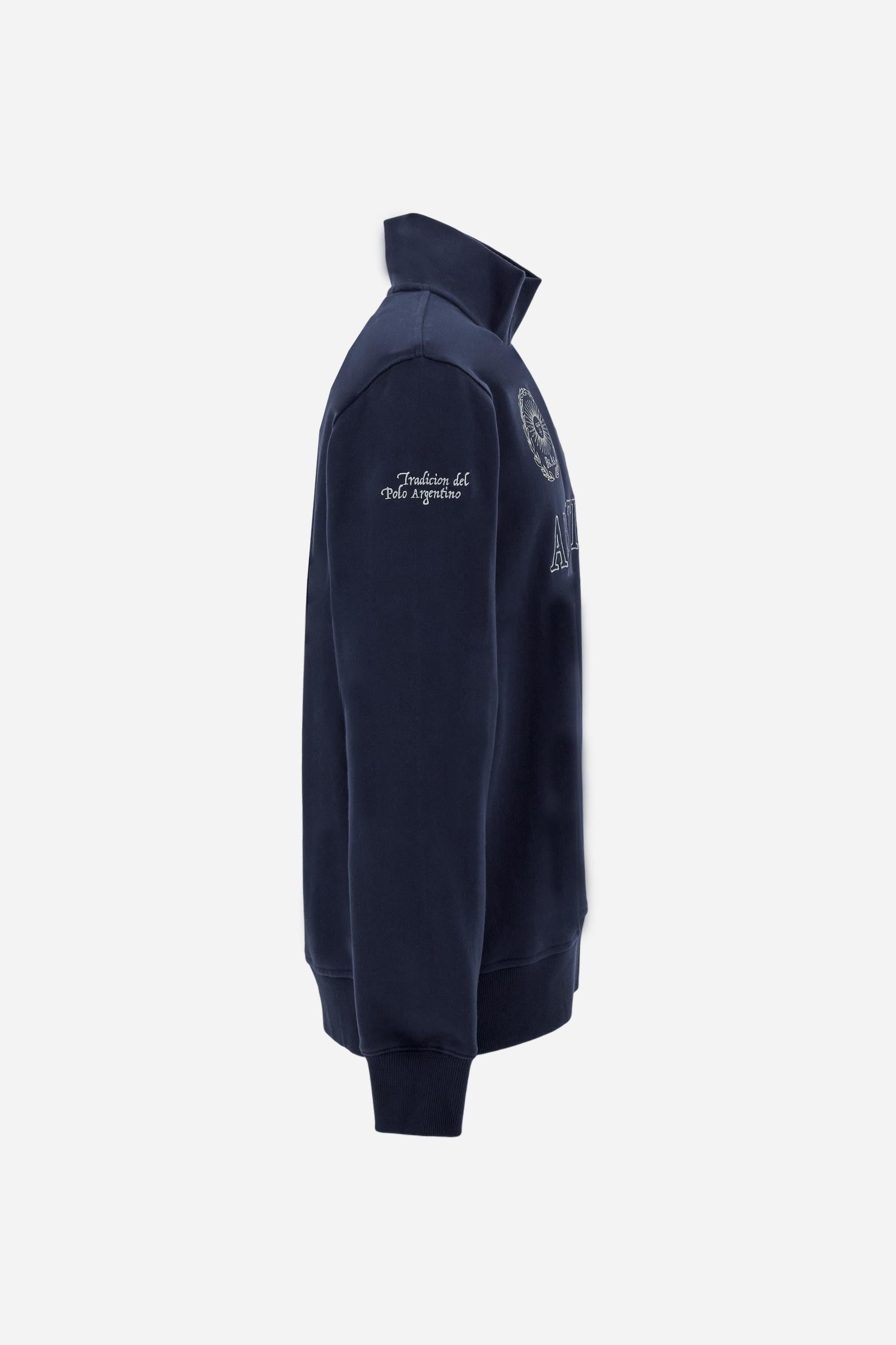 Men's long-sleeved solid colour sweatshirt in cotton. Made of pure cotton fabric with a soft, velvety touch. Practical half-zip opening and ribbed cuffs and collar details. Vivid multi-coloured with Argentina-inspired graphics on the chest and sleeves. The logo is embroidered on the left side of chest for a subtle touch of branding. The fit is regular to suit everyday wear. The model is wearing a size L. - Navy