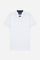Short-sleeved polo shirt for boys made from soft 100% cotton piqué in a solid colour. The classic style features a regular fit, piqué collar and two-button front closure. The contrast inner collar detail and the multicolour logo embroidered on the chest enrich the garment. The detail under the collar completes the design with a distinctive touch. - Optic White