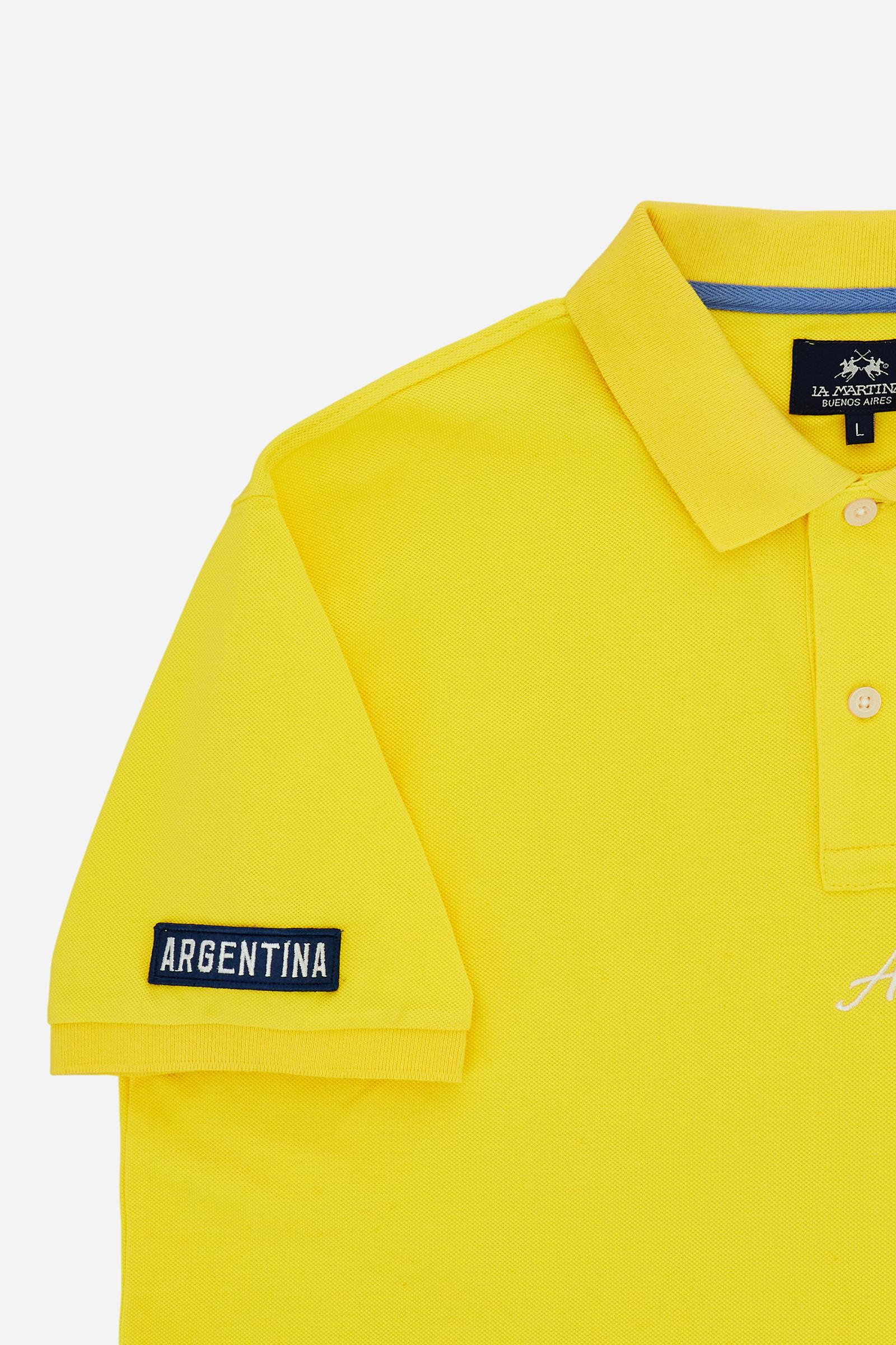 Men’s cotton piqué polo with regular fit. Nations collection featuring country-inspired graphics. - Empire Yellow