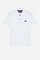 Short-sleeved polo shirt for boys made from 100% cotton jersey in a solid colour. The style features a regular fit, two-button front opening and shirt collar in the same fabric. The contrast inner collar tape recalls the small brand logo embroidered on the chest, adding a distinctive detail to an essential and versatile garment. - Optic White