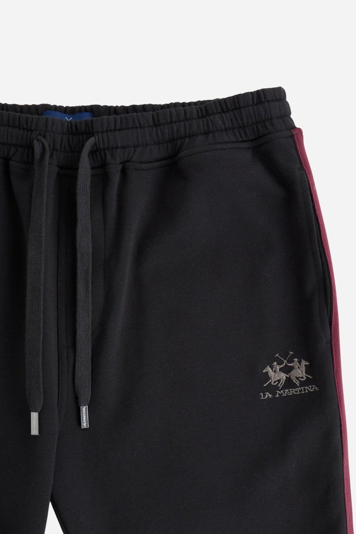 Men's cotton interlock jogging pants with elastic waistband, adjustable drawstring, side and back pockets, multicolored stripes, and a soft, sporty silhouette. - Black