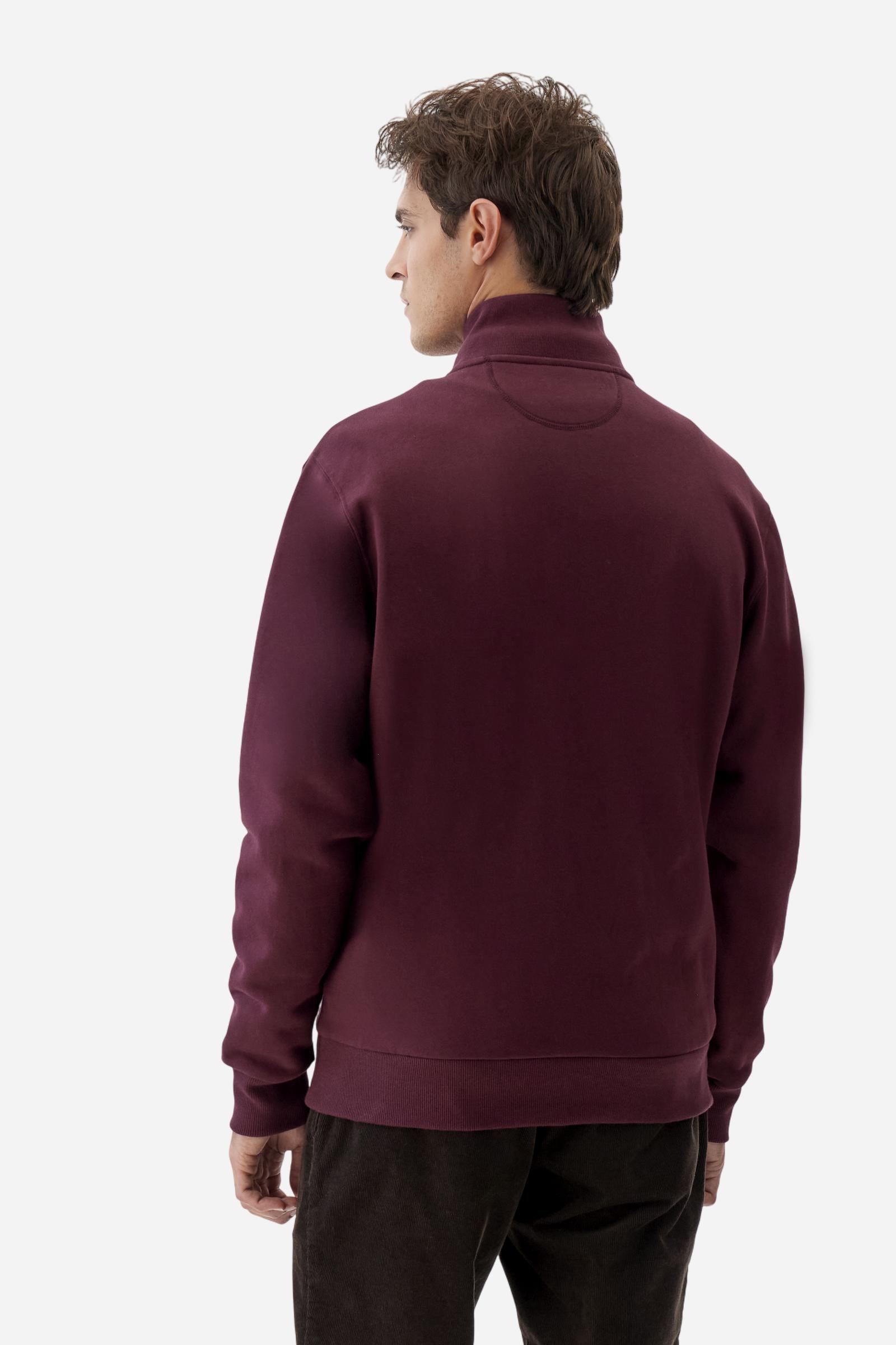 Men's long-sleeved solid colour sweatshirt. It is made of comfortable 100% cotton fleece with a soft-brushed feel. Model with high ribbed neck and front zip opening. Solid colour ribbed cuffs and waistband. The large contrasting brand team logo is embroidered on the chest. A contrasting colour fabric number patch is applied to the right sleeve. The model has a regular fit that offers a comfortable, relaxed silhouette. The model is wearing a size L. - Port Royale