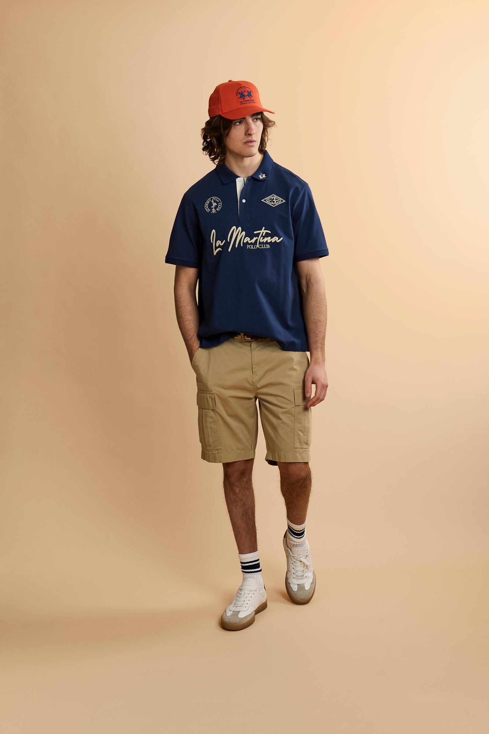 Short-sleeve polo in heavy cotton jersey with contrast details under the collar and placket. “La Martina Polo Club” embroidery on the chest with “Academy Polo Club” crest and additional embroidered detail. Soft contemporary fit. - Navy                                                                                                                                                                                                                                                                                     