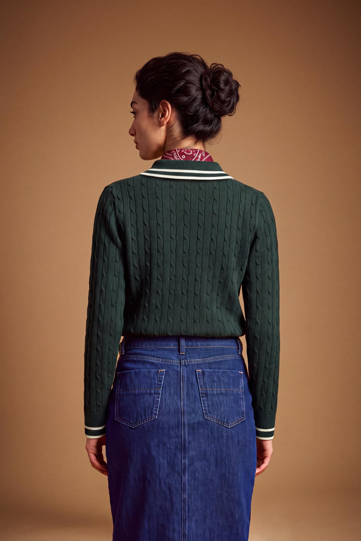 Women's long-sleeve polo in soft lambswool blend, featuring a vertical cable knit, contrast-edged collar, ribbed cuffs, and a slim, comfortable fit. - Scarab