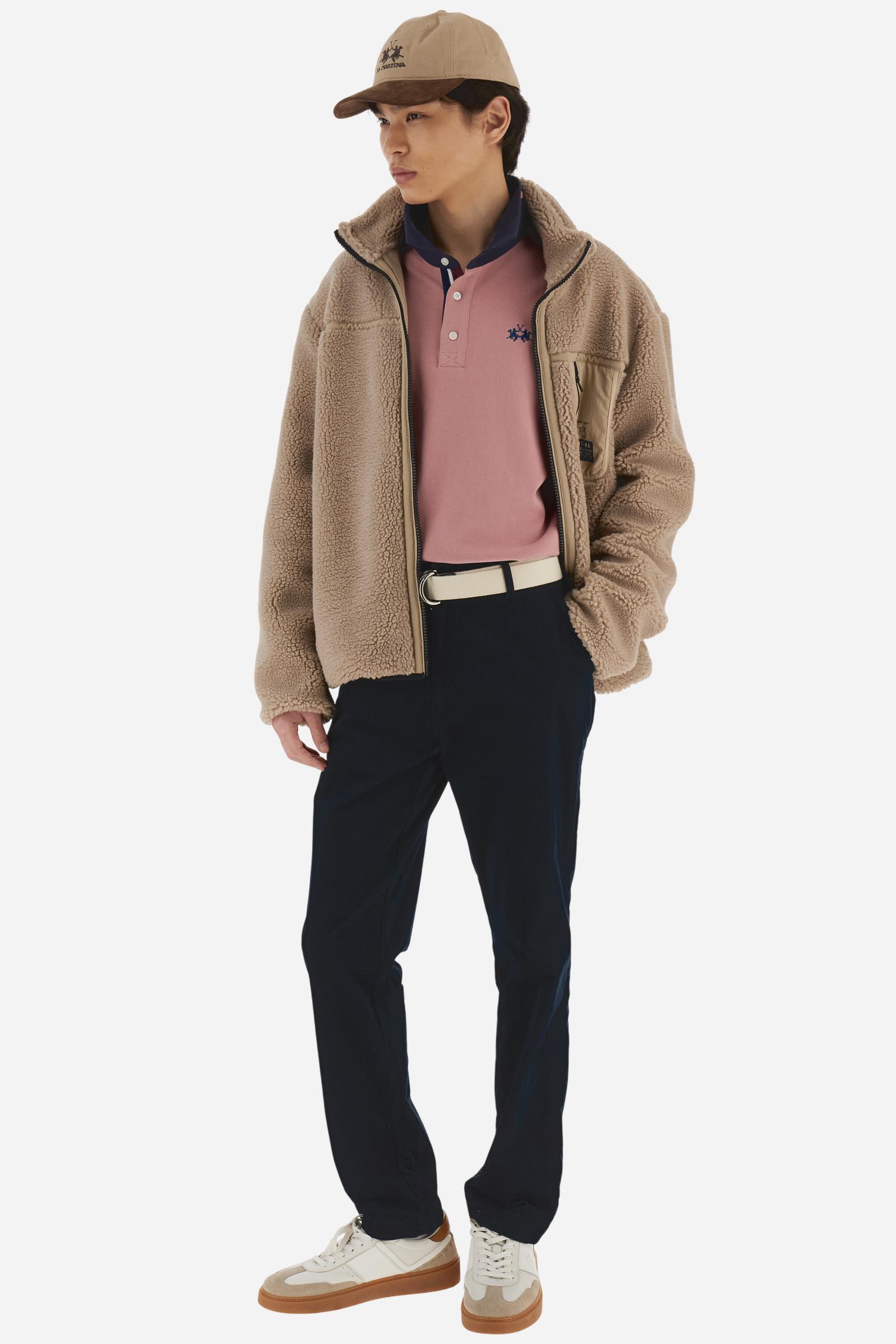 Classic men’s long-sleeve polo in soft-touch 100% cotton jersey. Contrast gabardine collar, three-button placket with multicolor striped tape. Iconic La Martina lettering printed in contrast under the collar. Small contrast logo embroidered on the chest. Regular fit for a balanced silhouette. Model wears size L. - Rose Tan