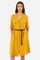 Women’s short-sleeved dress in solid color, made of twill tencel fabric. Flared silhouette, length above the knee. Waist marked by the belt supplied with the head, England capsules. V-neck and button closure. Two front pockets, also with button closure. On the back embroidery of La Martina logo tone on tone. The fit is regular. The model wears a size IT40. - Arrowwood