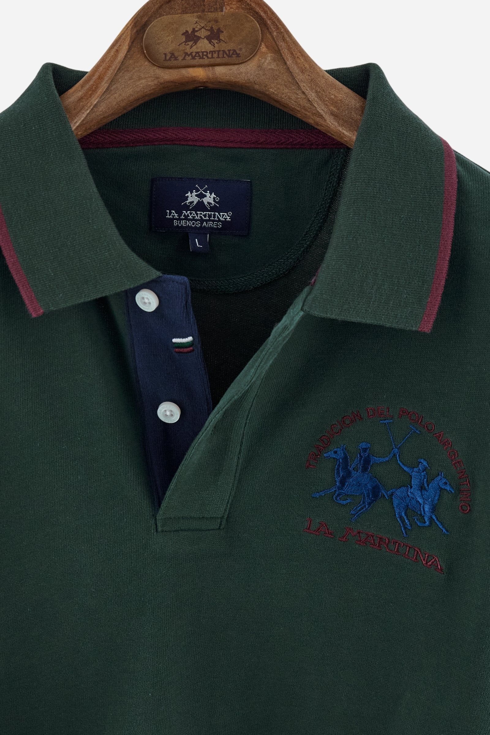 Men’s long-sleeve polo shirt in solid-colour cotton jersey with a warm, matte handfeel. Ribbed collar and cuffs with stripes and colour blocks in contrast, two personalised buttons and contrast details inside the collar. Patches and graphics on sleeves and chest celebrate the Official Polo Supplier team. The large multicolour logo is embroidered on the chest. Regular fit. The model wears size L. - Sycamore