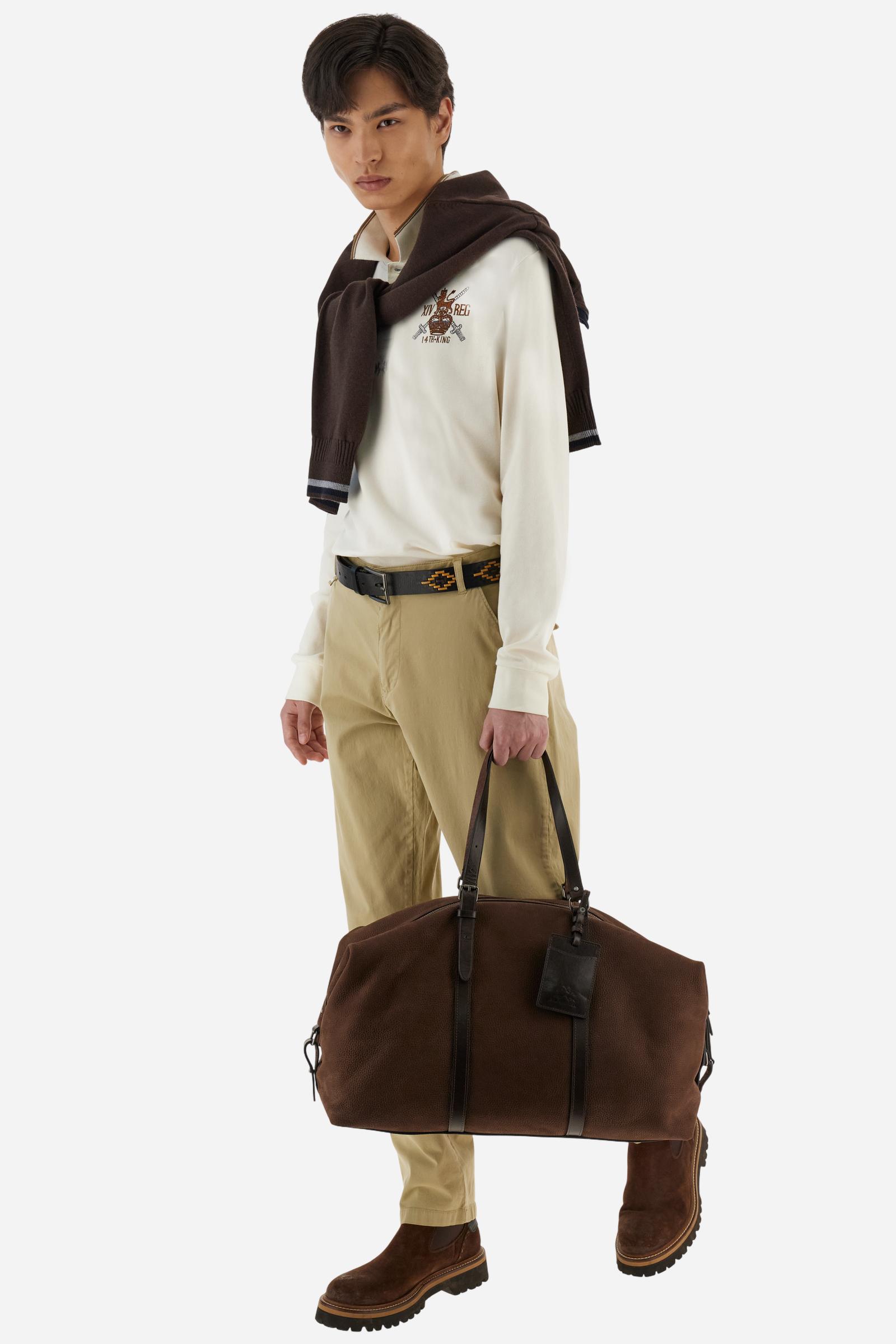 Long-sleeve polo shirt in stretch cotton jersey, soft and breathable. Ribbed collar with contrast striped edge and inner tartan ribbon. A colorful embroidered crest enriches the chest, complemented by a tonal embroidered logo under the placket with two personalized buttons. Regular fit for a versatile, timeless look. Model wears size L. - Pristine