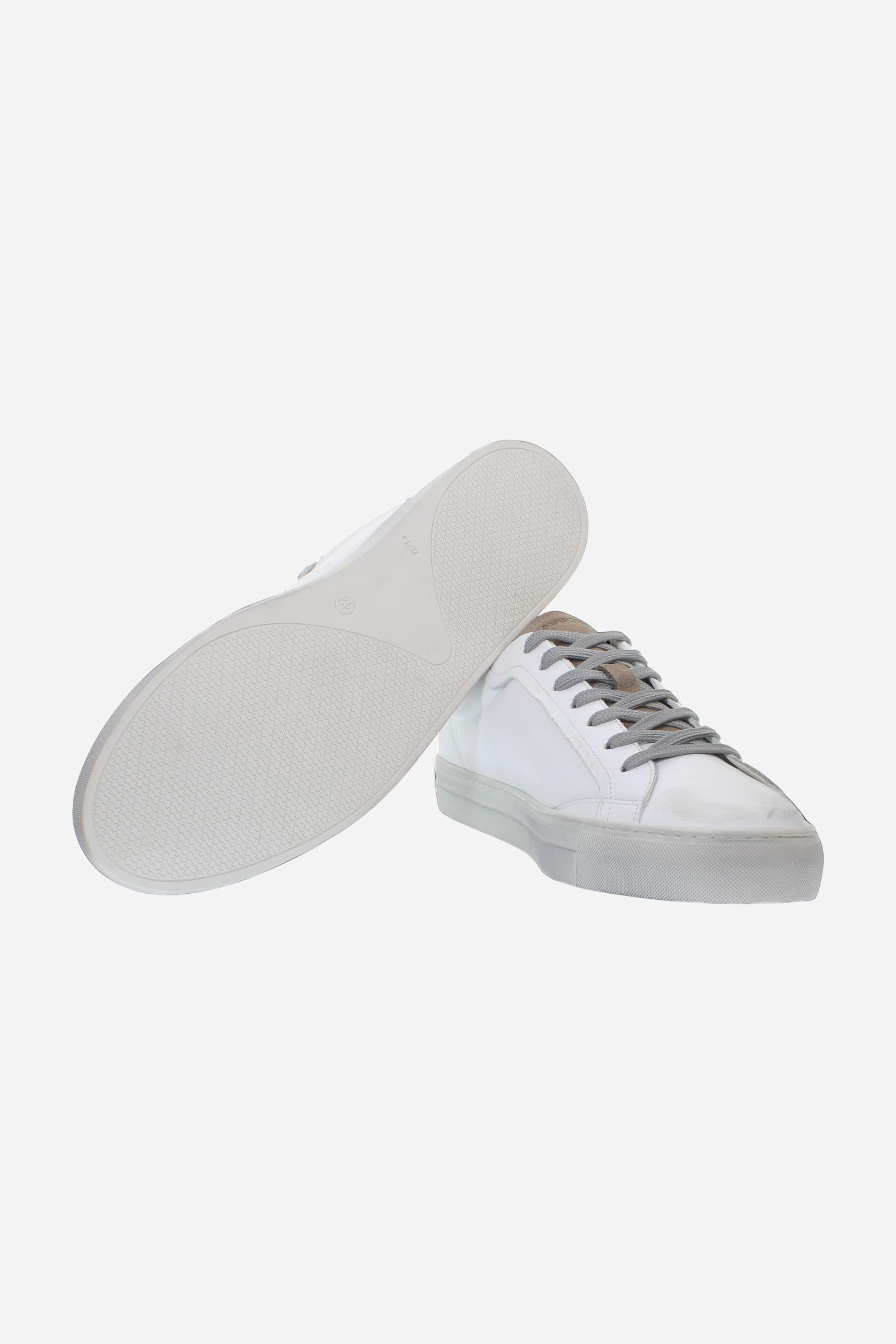 Leather sneaker blending vintage and modern style, with flexible divided tongue, nubuck heel, hand-stitched details, and a lightweight, comfortable off-white sole. - Optic White