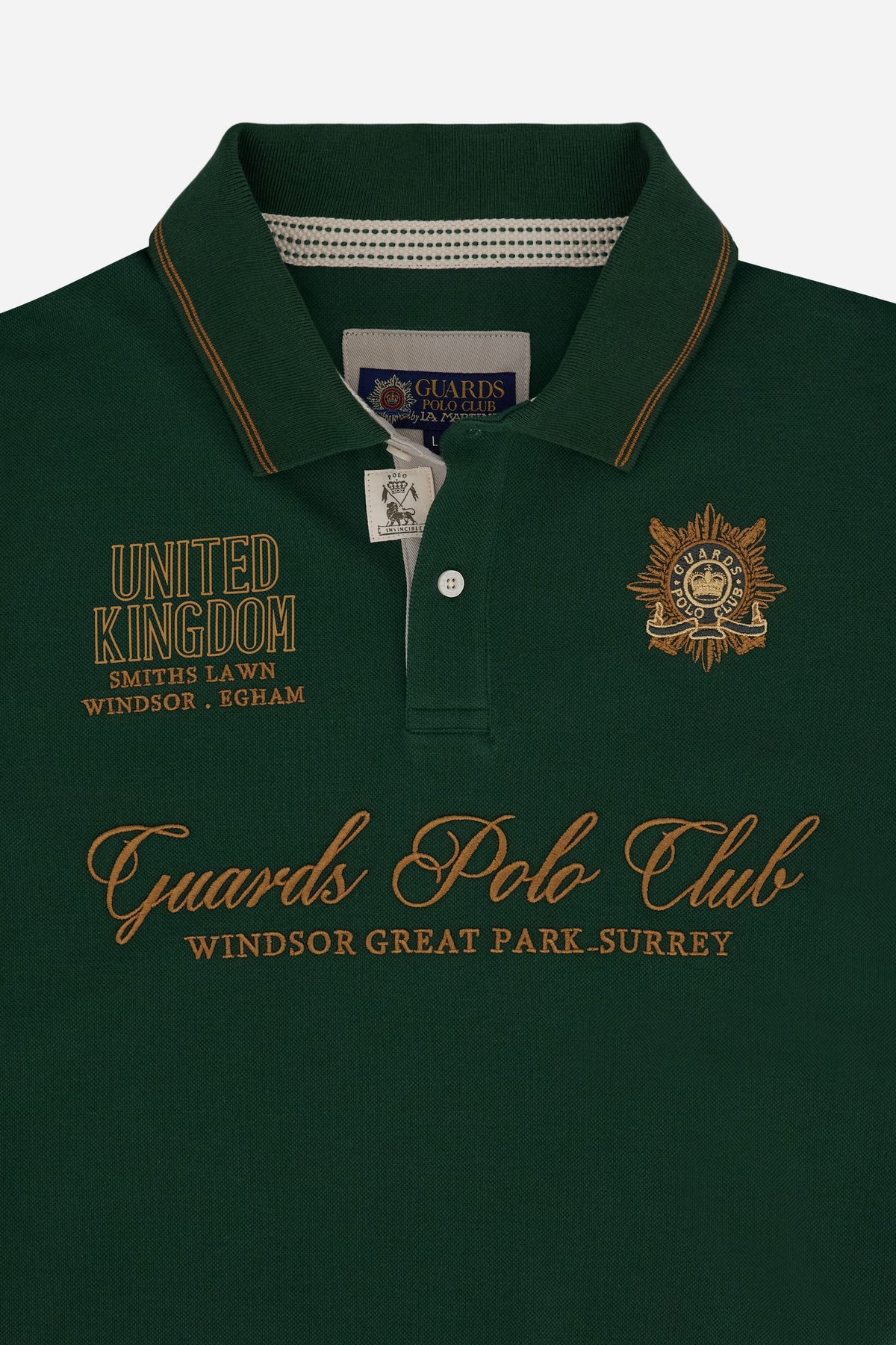 Men’s short-sleeve polo in solid-colour cotton piqué with contrast tape, ribbed collar, and embroidered Guards Polo Club graphics. Contemporary fit. - Pineneedle