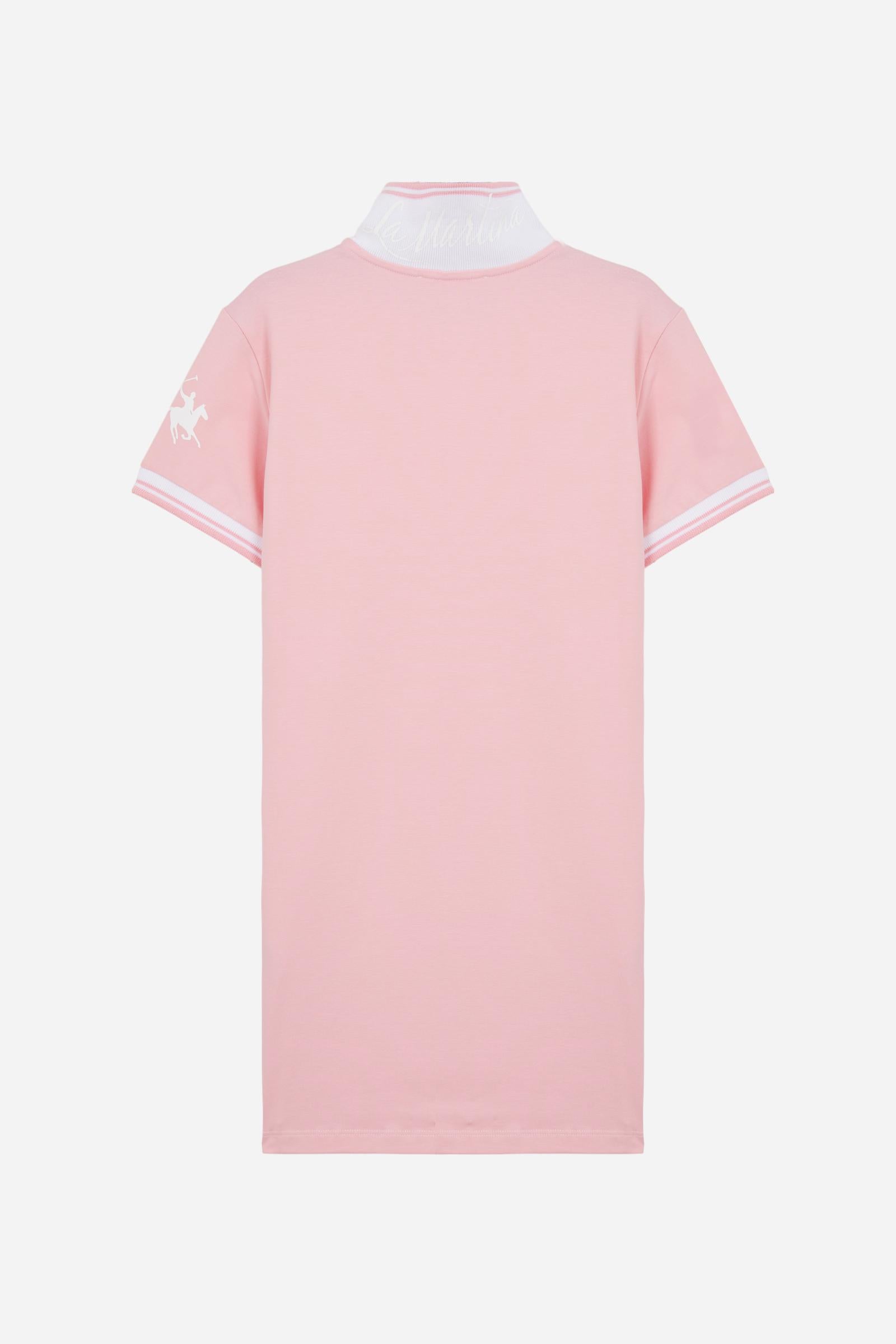 Short-sleeved polo dress for girls made from pure cotton piqué in a solid colour. The style features a comfortable fit, fluid silhouette and above-the-knee length. The two-tone ribbed collar, buttoned front opening and striped trims add a sporty and refined touch. The logo on the sleeve and the lettering under the collar complete the design. - FairTale