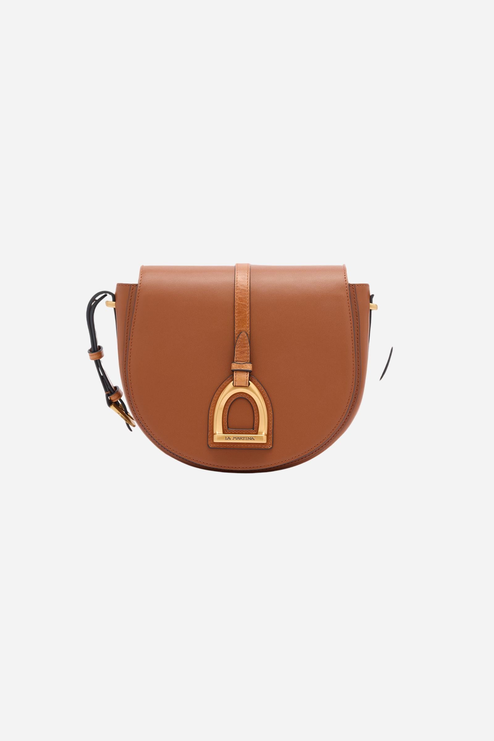 Small crossbody bag in calfskin leather and leather. Curved design with large golden buckle and contrasting details. - COGNAC/LEATHER